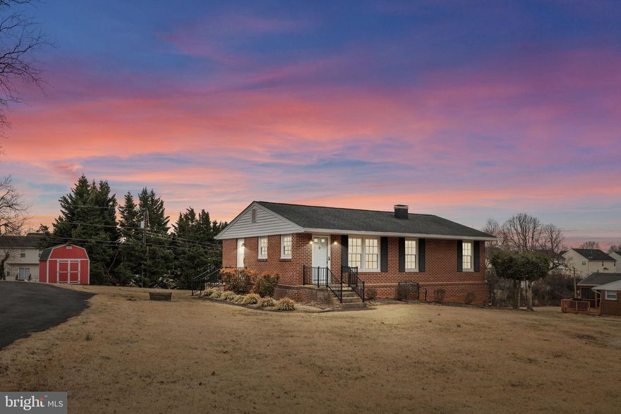 Welcome to 315 Lesco Blvd! A charming brick rambler conveniently located in Culpeper offering comfortable living and a spacious half-acre lot. This well-maintained home features just under 1,800 finished square feet with 3 bedrooms and 1 full bath, making it a great option for first-time buyers, downsizers, or anyone looking for one-level living with additional finished space.  The main level offers a bright kitchen with a breakfast area, a large living room perfect for everyday living or entertaining, and three spacious bedrooms. Updated windows (2017) allow for great natural light throughout the home.  The walk-out basement provides additional finished living space with built-in bookshelves and flexible room for a rec area, office, or hobby space. There is also space available to relocate the laundry area to the basement if desired.  Major updates include a new HVAC system in 2020 and a new roof in 2022, providing peace of mind for years to come.  Outside, the property sits on a wide open 0.5-acre lot with plenty of room for outdoor activities, gardening, or future improvements. A 12x9 storage shed provides additional space for tools and equipment.  Located just minutes from historic downtown Culpeper, shopping, restaurants, and commuter routes including Routes 29 and 15, this home offers the convenience of town amenities while still enjoying a spacious lot and quiet setting.