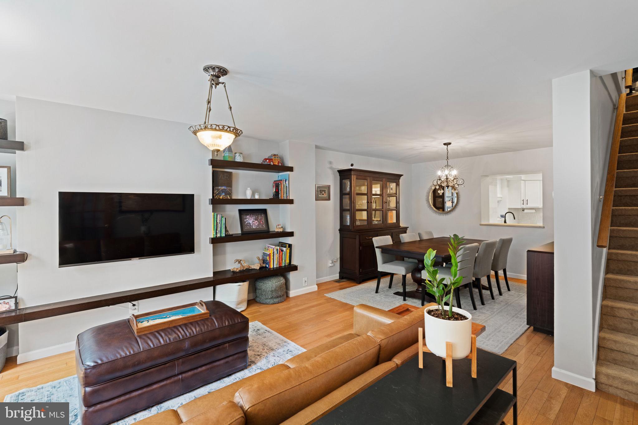 Now available for lease! Welcome to 1913 Pemberton Street—located on one of the most beloved, tree-lined blocks in Graduate Hospital, known for its quiet charm, friendly neighbors, and true sense of community. This beautifully maintained and thoughtfully upgraded home offers the perfect blend of original character and modern comfort, all within walking distance to Rittenhouse Square, Fitler Square, CHOP, UPenn, and the city’s top dining destinations. Located in the Marian Anderson school catchment. Step inside through a welcoming vestibule into the sunlit living and dining areas, where hardwood floors, custom-built-ins, and fresh paint set the tone. The recently renovated kitchen is a standout, featuring stylish two-tone cabinetry, quartz countertops, stainless steel appliances, a chic tile backsplash, and a dedicated coffee bar—perfect for your morning routine or entertaining guests. Just beyond, a spacious rear patio with stone pavers and flower beds offers a private outdoor retreat ideal for dining al fresco or relaxing in the warmer months. Upstairs, you'll find two generously sized bedrooms, including a south-facing room with a newly added closet. The oversized full hall bathroom features a tub/shower combo, single-sink vanity, additional storage, and houses a brand-new washer/dryer, making laundry day a breeze. The third-floor primary suite is a true urban retreat with a spacious bedroom, ample closet space, and a spa-like bathroom with a whirlpool tub, glass-enclosed shower, and double vanity. At the north end of the hallway, step outside to a peaceful roof deck, perfect for enjoying your morning coffee, curling up with a book, or simply unwinding above the treetops. Downstairs, the basement is both functional and fun. One half has been transformed into a home gym and play space, complete with a rock climbing wall for little ones. The other half offers a cozy lounge area—ideal for movie nights or a quiet escape—and includes additional storage. Additional upgrades include: new HVAC and water heater, freshly painted interior and exterior, new front security door and doorbell, a re-tarred roof, replaced curb stop/sewage line, and a basement drain added for a dehumidifier. This home is the rare combination of thoughtful updates, classic style, and an unbeatable location—with a welcoming block and community that truly feels like home.