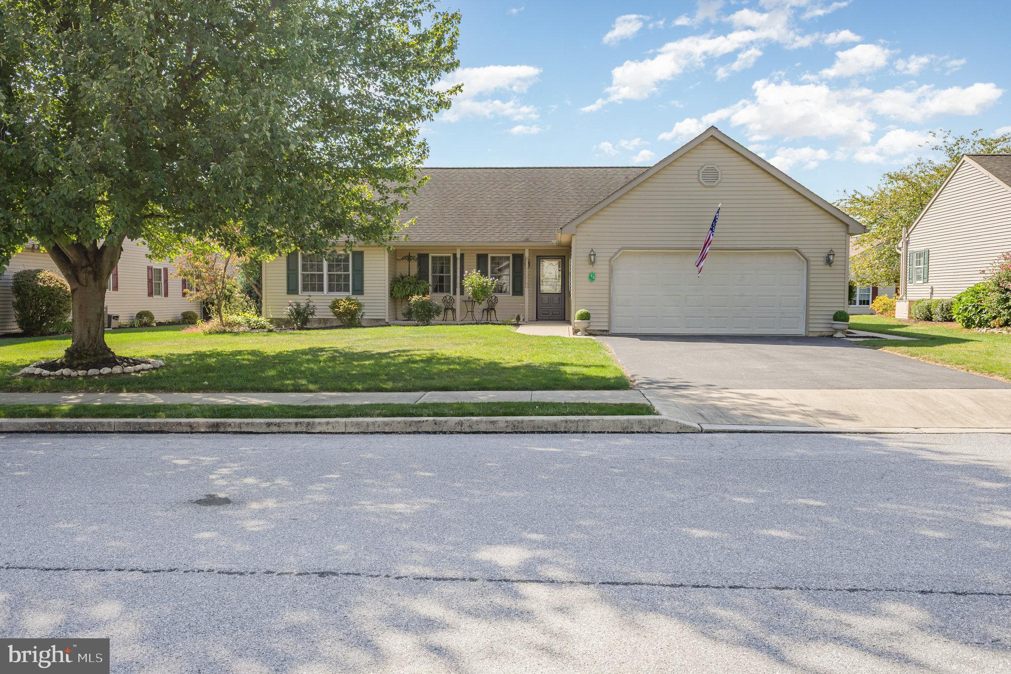 Welcome to Arbor Gate, where convenience and comfort converge in this well designed one-story home. As you approach, you'll be greeted with fresh landscaping and a charming covered front porch, inviting you to unwind and savor your morning coffee. Step inside to discover a welcoming foyer adorned with tile flooring and a thoughtfully placed closet. New luxury vinyl plank wood floors throughout this home and fresh paint welcome you and make it ready for you to move right in! The cathedral ceilings in the great room and dining room create a sense of grandeur, while the corner gas fireplace adds a touch of warmth and ambiance. The fully equipped kitchen boasts a gas stove, built-in dishwasher, microwave, and refrigerator, along with a pantry for your kitchen storage needs. The primary bedroom features an en suite bathroom and a generous walk-in closet. The primary bathroom showcases a double vanity, a walk-in shower and durable vinyl flooring. On the other side of the home, you'll find two additional bedrooms and a full bathroom, providing ample space for family or guests or an office. The sunroom, bathed in natural light from its numerous windows, offers a serene retreat, perfect for relaxation or creative pursuits. For convenience, there is a main level laundry/mud room and a two-car attached garage featuring a built-in workbench, storage space and a utility sink for your practical needs. Arbor Gate is more than just a home; it's a vibrant 55+ community that offers a gated entrance on Rt 422 for enhanced security and privacy. The land lease encompasses usage and maintenance of the meticulously landscaped common grounds, clubhouse, sewer, trash and recycling removal, and on-site management. The community clubhouse serves as a hub for countless activities and gatherings, boasting a banquet hall, fitness room, billiards, beauty salon, library, coffee shop, game room, and the breathtaking lake views with fishing and canoeing opportunities. A charming gazebo adds to the allure. Experience the joys of carefree living in this pet friendly community, where every day presents new opportunities for relaxation and connection. Schedule your tour today and immerse yourself in a community that embodies vibrant senior living!