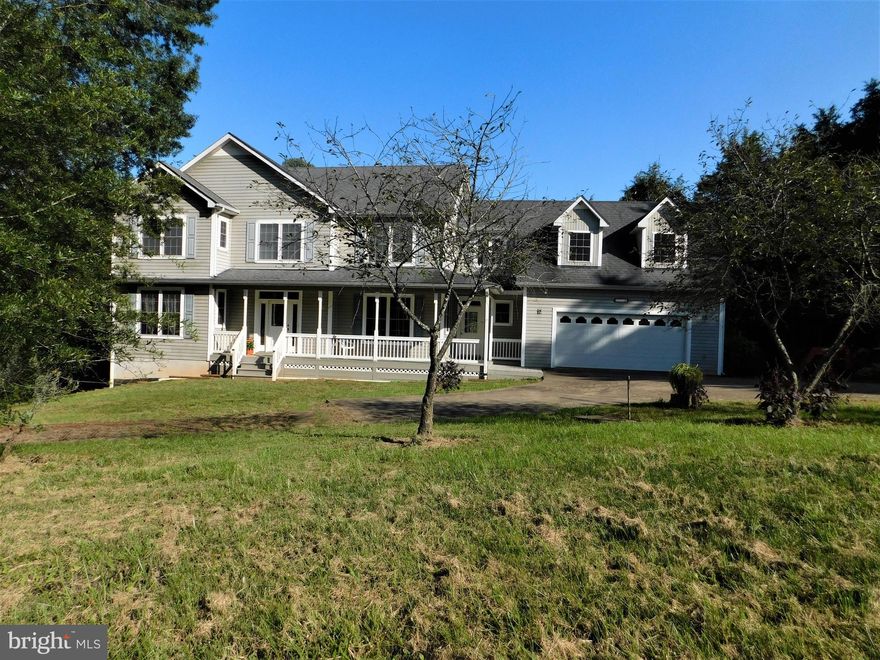 6 secluded, green acres with a pond &  Mine Run Creek! Custom built colonial with 9 ft ceilings on main level, gorgeous interior trims, including chair rail, crown mouldings & 6" base trim. Lots of built in cabinets & shelves sure to please. Gather in the large kitchen, open to breakfast room & family room. New stainless appliances & extra deep Elkay ss sink. Gas cooking,  fridge, microwave & DW.  Large pantry in kitchen if you like gardening & canning there is plenty of storage here to stock up! Gleaming solid red oak hardwood floors  just refinished and cover the main level living areas, plus custom oak stairs & handrails and upper hallway is hardwood too!  Gorgeous leaded glass front door with full transom & sidelights! Check out the custom etched glass transom above sliding door out to the huge covered back porch that overlooks your oasis! 4 Bedrooms and 3 full baths upstairs with laundry room & a 6' hall linen closet! The master wing features an office, or exercise room, the breezeway,  an enormous bedroom with 2 dormers.  Custom electrical,  lots of recessed lighting, ceiling fans w/lights in all bedrooms, new switches & outlets & brushed nickel lever handles & door hardware.  New carpet in bedrooms(10/1)!  Attached garage via breezeway/mudroom is a 24 x 24 fully insulated & painted, makes a nice spacious 2 car garage. 2 additional garage/workshop buildings with power & water down by the pond! The shop is 3 levels, garage on bottom, 2nd floor could be a hay barn, but is finished with sheetrock, full size steps to attic with hardwood floors would make a great artist studio! Chickens, horses & other farm animals permitted in agricultural zoning.  Mower shed/chicken coop is just past the pond. Too much to list in this unique property must see to appreciate! Lots of wildlife; deer, turkey, eagles, owls, songbirds & Mr Bullfrog to enjoy, plantings & nature.  Hunting stand by Mine Run creek, natural sandy area & fun at the creek for the dogs & whole family. Locust Grove School District & equidistant to NoVa, RVA, CVILLE, or FXBG & CULP.  So much to love close by in Orange Co  wineries, breweries, pick your own, farmers markets, Montpelier Hunt Race, Ellwood,  National parks & historic areas all close by.