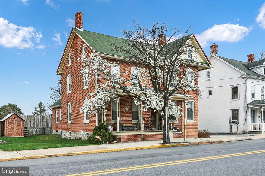 This all-brick colonial offers spacious town living with a blend of historic character and modern amenities including a brand-new gas furnace! Featuring 4 generously sized bedrooms and 3 full bathrooms, this home boasts original woodwork throughout, preserving its timeless appeal. You may also have a 5th bedroom on main level as current owner has, or a second family room/den. The renovated kitchen is charming and spacious and provides a perfect space for cooking holiday meals or trying your hand at your very own sourdough! Off the kitchen is the perfect nook for a breakfast area, reading nook, plant room and more! Outside, you will find a backyard oasis not usually found with town living. A large lot with a new pool last year, a deck, fenced in back yard and fire pit. A great entertaining space for all of your friends and pets! There is also a 3-car detached garage for all of your hobbies and toys! The driveway is just that, it is not a throughway alley. You can park anywhere from the front to the back! Schedule your showing today! You won't want to miss this one!
