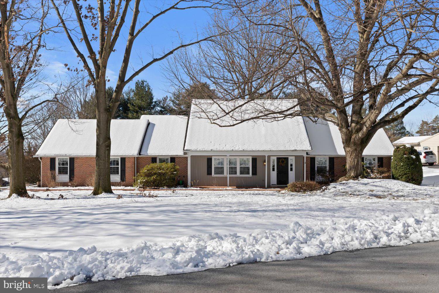 If you are looking for a beautifully maintained home in one of Hempfield's loveliest neighborhoods – then this one is for you! Situated on a picturesque corner lot, you'll initially be greeted with this home's wonderful curb appeal. The attractive side entry garage leads you to a charming brick walkway that will guide you to the front of the house, which is adorned by an inviting covered porch. As you enter the home you'll find ample hardwood floors throughout the main living spaces, two spacious living rooms - one with a fireplace, a formal dining room, a kitchen complete with updated granite countertops and newer stainless-steel appliances, and two of the four bedrooms (one of which is currently being used as a home office). There is also a main floor powder room and a laundry room which offers a door to access the backyard. The generously sized main floor primary bedroom is complete with an en-suite double vanity bathroom with newer granite tops and a spacious walk-in-closet. The second floor contains two additional bedrooms and a full bathroom with a double vanity. Welcome in spring on the lovely brick patio out back or by cozying up by the fireplace in the family room. Either way, this lovely home has been well loved for 3 decades now and is finally ready to make new memories with it's aspiring owners! *** OPEN HOUSE - Sunday 3/3 from 1-3pm ***