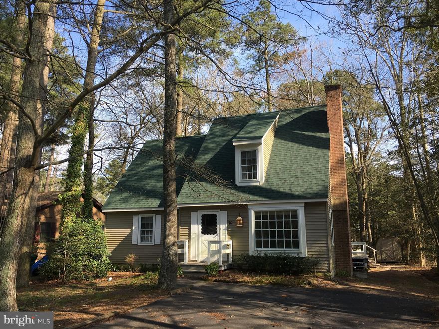 Adorable home nestled in the Ocean Pines community. First floor sunny living room with fireplace, separate dining room, master bedroom suite, sunroom. Additional bath and 2 bedrooms on second floor. Storage shed. HOA fee to be verified. Owner is licensed RE agent.