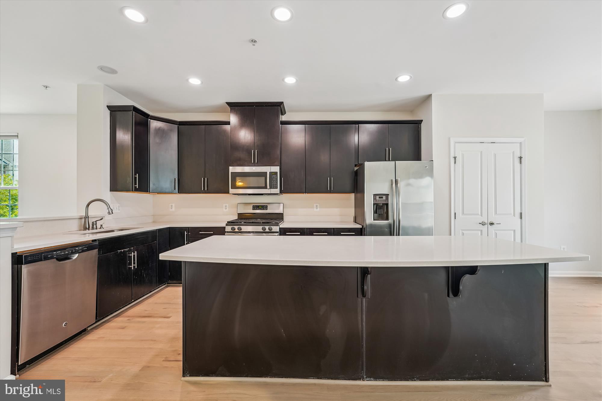 Gorgeous 4 level townhome conveniently located, Open Concept living area with Balcony, Loft/Office/BR with Balcony, 2 car garage and much more!!
