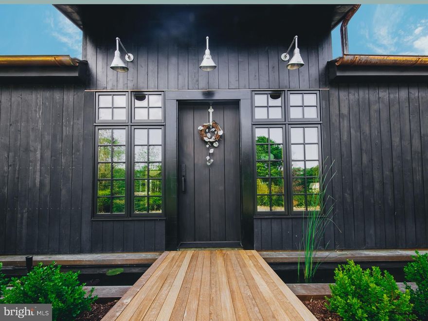 Unique and Historic Brooznoll!   Welcome to 1639 East Street Road, also known as Brooznoll, meaning Breezy Knoll built approx 1723.  Entering this partially furnished, historically rich, nearly 300 year old gated real estate on about one acre, one will find a truly eclectic and zen-like atmosphere.  Brooznoll offers modern amenities and a Scandinavian design aesthetic.  Features include five original 18th century fireplaces, three patios, and an in-ground heated gunite pool enclosed by ipe(aka Brazilian Cherry ) wood.  Brooznoll can be separated into the original 18th century stone home, a 20th century part, and a 21st century part. The entire residence has received new cedar and metal roofing, floor to ceiling windows, and areas of the newer development feature radiant heat.  Surrounding the home is an establish perennial garden with farmland bordering this property for maximum privacy.  Crossing a small bridge over a koi pond, one will enter into the most recent renovation to find exposed beam vaulted ceilings.  To the right of the entryway is the mudroom with second level storage and access to the back patio.  The kitchen features a 120 year old black soap stone sink, extra large fireplace &  seating/cooking area.  Off of the kitchen is the dining room flanked by a large fireplace. A guest room with fireplace & a whitewash hardwood floor sits off of the dining space with views of the pool.  The main level full bath features floor/wall tiled stone design, a walk-in rain shower,  radiant heat in the floor, original oak counter & curtain enclosed washer & dryer.  On the second level lies two additional bedrooms & a master suite with a private stair case entry. This master suite boasts a fireplace, seating area, & en-suite. The en-suite includes a rain shower, freestanding sink, a separate toilet room & sitting area to bring modern amenities to the rustic atmosphere.  Next to the master suite lies a secondary bedroom with a sitting area. The final bedroom is loft style with accents of the home's stone exterior, custom Oak Sky bed, radiant heat  and views of the pool and farmland.  Brooznoll is ready for today's buyers with its combination of modern upgrades & original features. Within miles you will find yourself enjoying family oriented  shopping possibilities such as award winning salons, spas & a wide variety of dining choices. Don't miss this rare opportunity to own a distinctive home in a truly special location