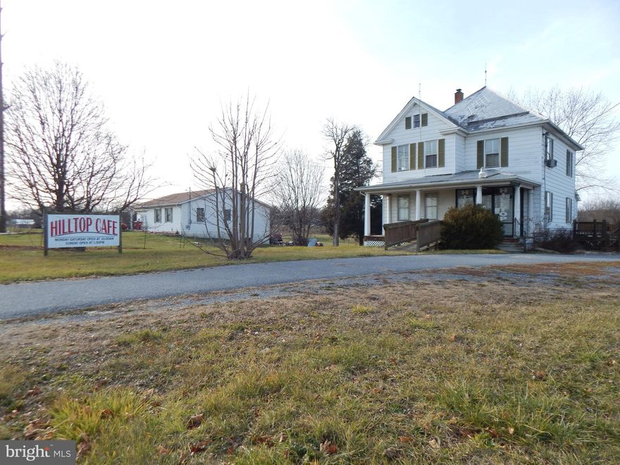 Two story colonial sitting on almost 4.5 acres of unrestricted land right outside of the Spring Mills area! This could be an excellent lot/location for townhomes (with proper approvals). The current home has been modified and was used for light food service/entertainment/gaming machines. A ramp has been added to the front for accessibility. His & Hers restrooms have been added to the main floor. There are additional outbuildings on the property and public sewer runs across the backside of the property. Property is listed for the commercial value of the land only (not the structures).