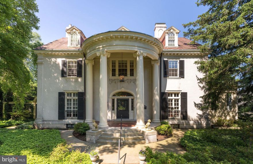 This magnificent 1904 Georgian Revival mansion seamlessly combines grandeur, luxury updates, and comfortable elegance. Nestled on the most sought-after block of Goodwood Gardens, one of Baltimore’s premier streets, this stately residence offers over 6,300 square feet of sophisticated living space, perfect for both grand entertaining and everyday living.
With 6 bedrooms and 5.5 bathrooms, this home features exquisite updates by architect Vincent Greene and interior design by Dan Proctor of Kirk Designs. As you enter, you are greeted by an oversized foyer with leaded glass elliptical transom windows, a classic Georgian Revival staircase, and intricate crown molding. Throughout the main level, you’ll find stunning oak hardwood floors, double pocket doors, and French doors that create a harmonious flow between rooms.
The expansive family room is anchored by a marble gas fireplace and oak floors, while the formal living room includes mahogany built-ins, an antique safe, and another marble gas fireplace. The elegant dining room features box molding, a chandelier, and a marble wood-burning fireplace.
At the heart of the home is the spectacular 32-foot chef's kitchen, a breathtaking space designed for both function and beauty. With heated travertine flooring, top-tier appliances from Wolf, Sub-Zero, and Fisher & Paykel, quartzite and granite countertops, and a custom stone range hood, the kitchen also features a bright dining area, cabinet lighting, a skylight, and a central island. Adjacent is a large screened-in porch overlooking the lush gardens and expansive yard—an idyllic spot for both relaxation and al fresco dining.
Off the kitchen, you’ll find a well-appointed custom mudroom, a home office, and a sunroom. The second level features a luxurious primary bedroom suite, complete with a gas fireplace, and a stunning recently renovated marble spa-like bathroom with heated flooring, and dressing room. This level also includes a second ensuite bedroom, a sumptuous study with mahogany library built-ins, a hall bathroom, and a laundry room.
The third level houses three charming bedrooms, two with ensuite bathrooms, all adorned with gorgeous heart pine floors. A hidden bookcase door reveals a spacious lower level, which includes a recreation area perfect for ping pong, ample storage, and a climate-controlled wine room.
This home is equipped with modern smart features, including Lutron lighting and whole-house audio. Major systems such as electric, plumbing, and HVAC have been updated for your convenience. Set on just under ¾ of an acre, the grounds are enchanting with cobblestone and bluestone patios, a Koi pond with a waterfall, a gazebo, a variety of perennials, stone walls, and a spectacular display of azaleas in the spring. The property also includes a two-car garage for sheltered parking.
Located in Baltimore's highly sought-after historic Roland Park neighborhood, this majestic home offers the best of both worlds—peaceful, stately living within close proximity to local restaurants, shopping, community amenities, and top schools. It is truly a one-of-a-kind property that offers unparalleled living at its finest.