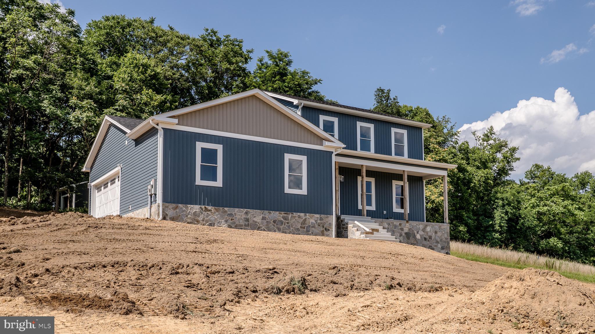 Stunning New Construction Colonial on 2 Acres with Main-Level Primary Suite
Experience timeless elegance and modern luxury in this beautifully crafted, new construction Colonial set on 2 acres of peaceful countryside. Need to be close to the VA or major commuter routes? This property has you there! With 4 spacious bedrooms, including a luxurious main-level primary suite, this home offers a perfect blend of classic design and contemporary comfort.
Step inside and discover an open-concept layout filled with natural light, luxury vinyl plank floors, and custom finishes throughout. The kitchen is a chef’s dream, featuring high-end appliances, quartz countertops that flows seamlessly into a bright dining area and inviting living room.
The main-level primary suite is a true retreat, offering privacy, comfort, and elegance. It features a generous walk-in closet and a spa-inspired en-suite bath complete with dual vanities, a walk-in tiled shower, luxurious heated floors — the perfect touch for chilly mornings.
Upstairs, you’ll find three additional well-sized bedrooms, a full bathroom with soaking tub. With 2 acres of land, there's plenty of room for outdoor living, gardening, or even a future pool or barn.
Built with quality craftsmanship with Superior Walls and attention to detail, this home includes modern conveniences, and the peace of mind that comes with brand-new construction. Located in a quiet, scenic setting with easy access to local amenities, this Colonial is the perfect place to call home.
There is an additional 2.3 acre neighboring lot available for purchase if you more land is something you are looking for.