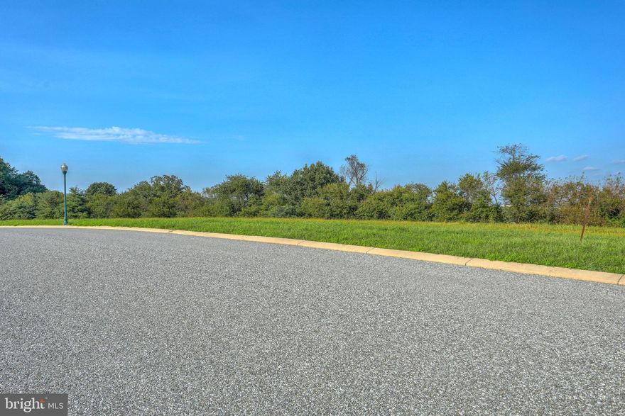 Contact your agent for more information.    Great views on this ready to build lot in popular Spring Forge development. All public utilities.  Sidewalks and lantern style street lights. Excellent location. Beautiful curved streets. Owner financing available. $500 HOA fee due at settlement. Additional lots available