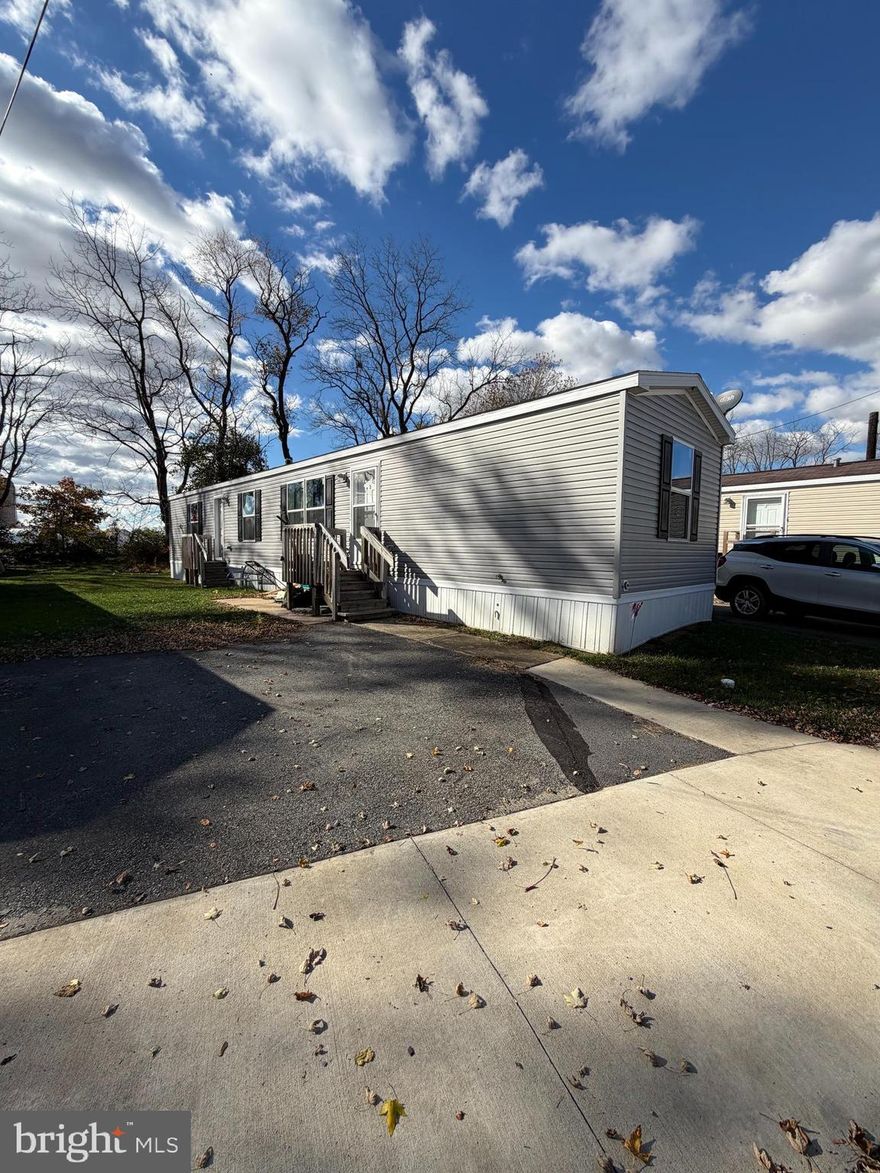 Experience easy, low-maintenance living in this beautifully kept 2022 model home! Featuring 2 spacious bedrooms and 2 full bathrooms, this move-in-ready property offers comfort and convenience in a quiet, well-maintained park. Enjoy off-street parking, efficient gas heat for cost savings during the winter, and a peaceful setting that’s perfect for relaxing and unwinding. Modern, affordable, and hassle-free — this home is ready for you!