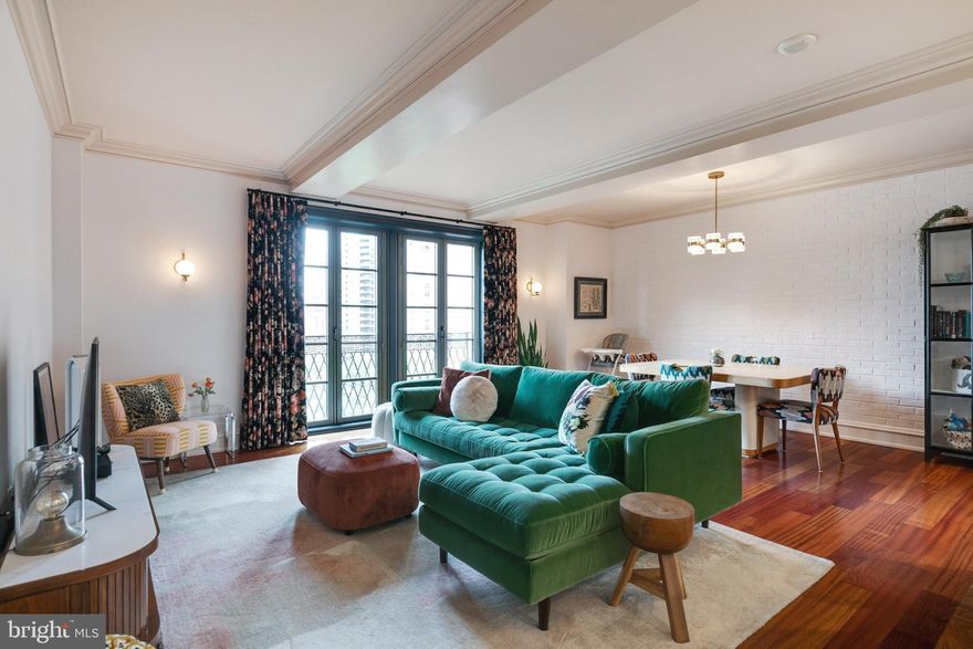 Wake up to the breathtaking, treetop views overlooking Rittenhouse Square in the iconic Parc Rittenhouse Condo! This stunning 10th floor unit offers a 1,571 sqft residence along with decadent features and amenities that are sure to impress any admirer of fine taste, including a private parking spot, lovely Juliet balcony facing the park, an additional storage unit and Brazilian Cherry hardwood floors throughout!  Enter through a foyer into the open concept living and dining room with tray ceilings and stylish white brick wall, adding some historic yet modern charm to the space. Turn your attention towards the state of the art kitchen, custom built by award winning designer Joanne Hudson, featuring a Wolf gas range, Sub-Zero refrigerator, Miele dishwasher and Sub-Zero wine fridge! There are 2 bedrooms along with a den, currently being used as a third bedroom. The master bedroom has 2 custom walk-in closets and an en-suite bathroom with double sinks and a glass door stand up shower. This unit is equipped with 2 fully independent heating and cooling units separate from the main building system as well as new light fixtures updated as early as 2 years ago. Residents of the Parc Rittenhouse immerse themselves in all the luxuries that the building has to offer, including 24 hour concierge and maintenance, landscaped rooftop with outdoor pool, whirlpool spa, sundeck with lounge chairs, clubroom, state-of-art fitness center, the list goes on! Enjoy some of the finest dining that Philly has to offer just within walking distance, including 3 phenomenal restaurants like Stephen Starr's Parc, Via Locusta and Devon Seafood on the ground floor, not to mention some of the city's best retail shopping, bars and cafes. Schedule your showing today to see all that this show stopping home has to offer!