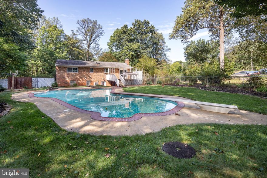 Charming Updated Split Foyer on 1 Acre in Haymarket, VA
Nestled on a beautifully landscaped one-acre lot in western Prince William County, this updated all-brick split foyer offers the perfect balance of modern living and timeless charm. Located just off Waterfall Road, the home boasts a bright and open main level with refinished hardwood floors, creating a welcoming space for gatherings of friends and family.
The tastefully remodeled kitchen and bathrooms add a contemporary touch, while the spacious lower-level recreation room with a brick hearth and fireplace provides a cozy retreat. Sliding glass doors lead to a deck that overlooks the custom in-ground Gunite pool, making it an ideal home for entertaining and outdoor living.
Practical features include an oversized carport, newly resurfaced--paved asphalt driveway, ample off-street parking, a utility shed, and a fully fenced backyard for privacy. A covered front porch spanning the length of the home adds classic curb appeal and a perfect spot to enjoy the peaceful surroundings.
With easy access to commuter routes 15 and I-66, this property offers the serenity of rural living while being just minutes from the Town of Haymarket and Gainesville’s Promenade with shopping, dining, and entertainment.
Don’t miss the chance to make this special home your own — a private retreat that offers both convenience and comfort!