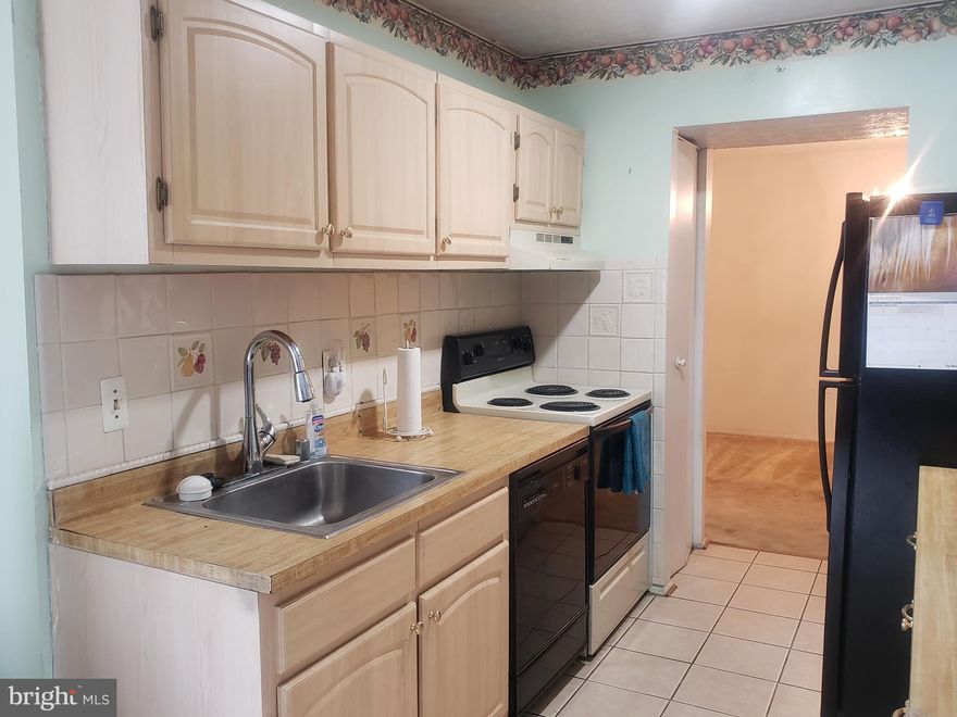 Affordable starter home! Nearly 1200sq ft, one level unit in sought after neighborhood. ALL utilities are included in the condo fee and more!  Internet is not included. Two bedroom, two full baths, walk in closet, newer cabinets, some ceramic flooring, balcony , washer and dryer in unit. Individual storage space for each unit on the ground floor. Convenient to shopping, restaurants,  walk to bus stop. Minutes to Washington DC,  UMD, Baltimore, and Northern Virginia. Located just off of 495 Beltway and BWI Parkway.  Shown by appointment only.