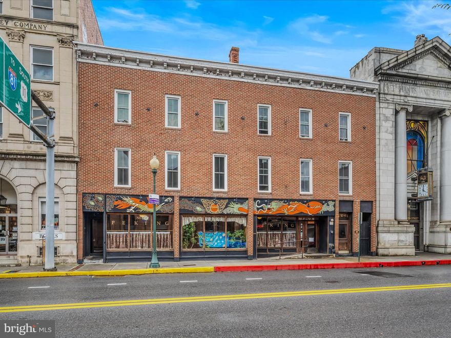 GREAT INVESTMENT OPPORTUNITY!! This property features 6 large floors in the up and coming downtown district of Martinsburg. The first and second floors make up the restaurant. The third floor features a 1 bedroom apartment and a 2 bedroom apartment. The 1 bedroom features a foyer, bathroom, kitchen, large living room and bedroom with lots of natural light. The 2 bedroom features kitchen, bathroom, spacious living room, bedroom 1 with walk-in closet and large primary with French doors. Floor four is unfinished. It does have plumbing for 2 bathrooms and 2 kitchens.  The fifth floor features 2 more apartments. The one bedroom apartment features a large living room, kitchen, and bath. The 2 bedroom includes a spacious living room, bath, and kitchen. The primary features a walk-in closet. There is an office space in this apartment that could easily be turned into a bedroom if desired. The sixth floor can be apartments, offices, or even an event space. There is plumbing already in 2 of the rooms. This property has tons of potential. You start ahead with a long term tenant already in place. Call for more information today!