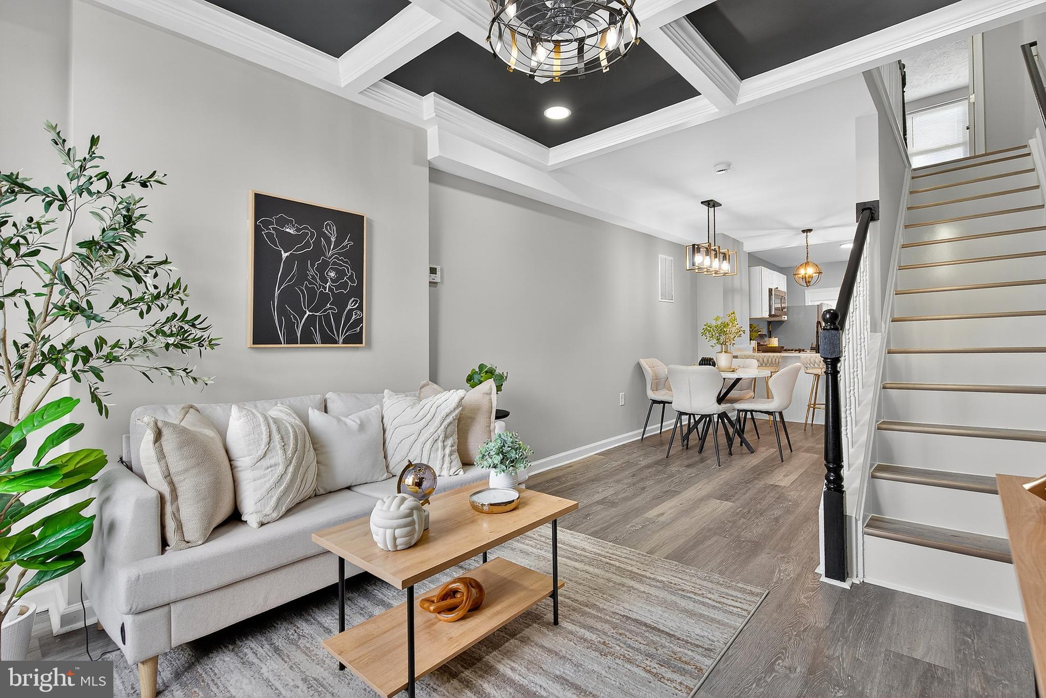 This beautifully renovated townhouse offers a perfect blend of modern style and cozy comfort. With three spacious bedrooms and three full bathrooms.
Step inside and be captivated by the architectural details, including elegant tray ceilings that add a touch of sophistication and create a sense of grandeur. The kitchen is a chef's delight, featuring sleek stainless steel appliances that complement the stylish, functional design.
The finished basement provides a versatile space perfect for a home office, media room, or gym. The home also boasts a private, fenced backyard, an ideal spot for relaxing or entertaining. Located just moments from the scenic Carroll Park and with convenient access to I-95, this townhouse offers a fantastic opportunity to enjoy a great lifestyle with an easy commute to all that the city has to offer.
