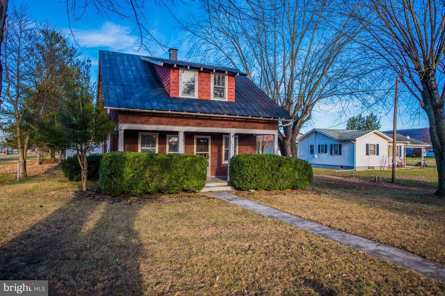 Historical cape cod in the valley. Sitting on 1/2 acre of UNRESTRICTED property. Large living spaces with original interior doors and handles for extra character. Views of the mountain from the front porch. Two outdoor sheds for storage or animals. Bring your chickens and start your mini farmette. Brand new flooring throughout and all new kitchen cabinets. Property is being sold "as-is".