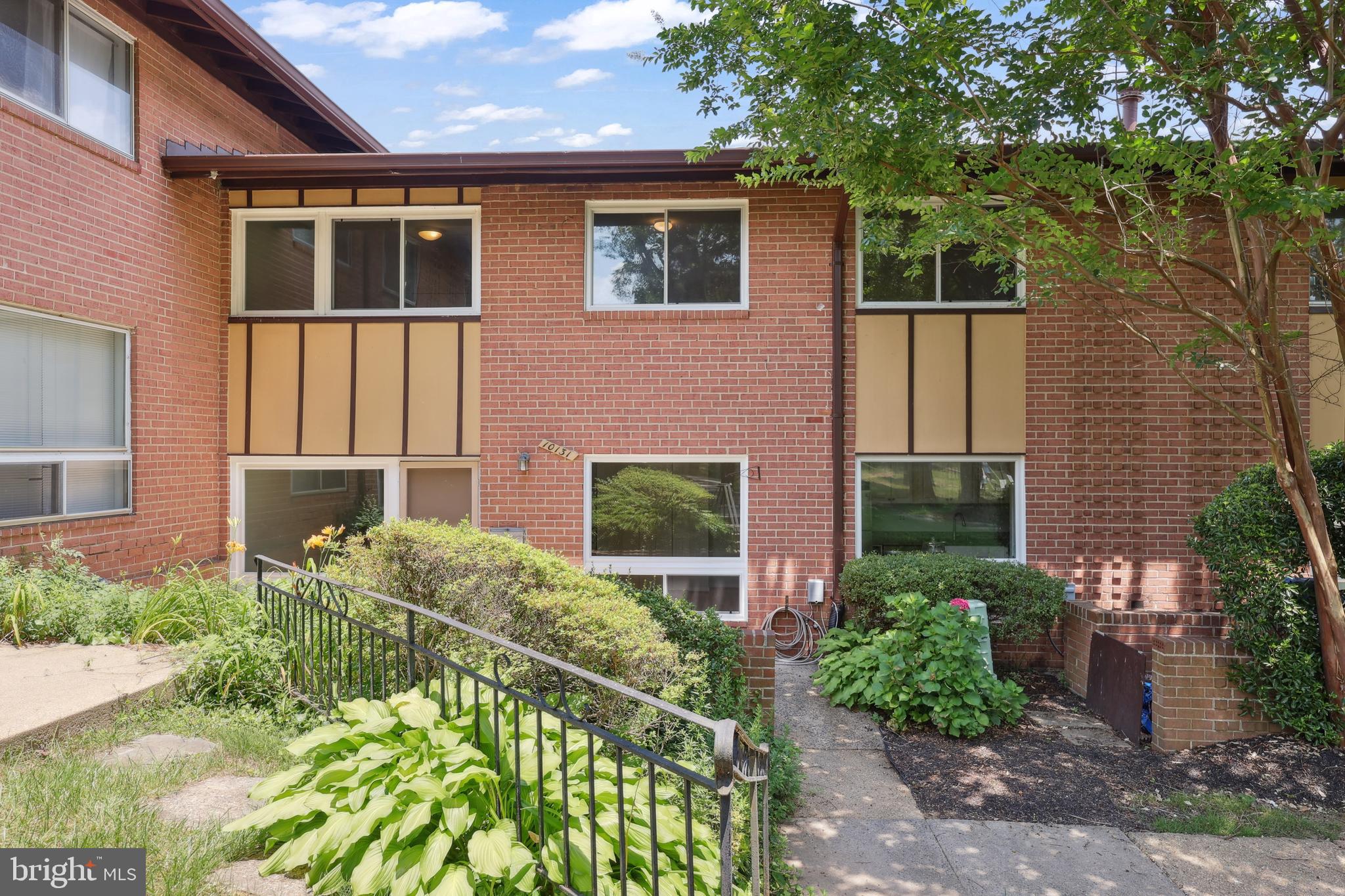 Located in the sought-after Fair Woods neighborhood, this beautifully updated 2-level condo blends comfort, style, and functionality. The space is beaming with natural light throughout, creating a warm and inviting atmosphere. The open-concept main level features laminate flooring, fresh paint, and seamless flow between the living, dining, and kitchen areas—ideal for both daily living and entertaining. The kitchen boasts stainless steel appliances and tile flooring, while a convenient half bath on the main level is perfect for guests. A separate laundry room offers generous storage space. Upstairs, enjoy hardwood floors throughout, three spacious bedrooms including a large primary with two closets, and a shared full bath with updated finishes. Step outside to a spacious porch patio just steps from the community pool and basketball court. This home is minutes from I-66, Route 50, and Fairfax County Parkway for easy commuting, and close to Harris Teeter, Fair Oaks Mall, shopping centers, and a wide selection of dining options. Schedule your showing today!