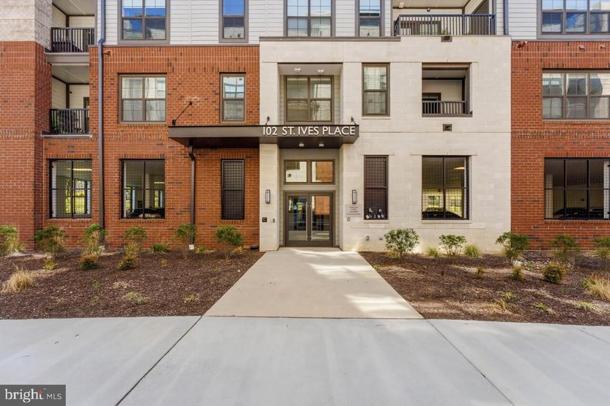 Welcome to one of the largest floor plans at The Flats at National Harbor, a rare top-floor corner unit offering over 1,700 sq ft of upscale, single-level living. Built in 2023, this 2-bedroom + den, 2-bath residence combines modern design throughout.  Upon entry, this condo will amaze you with the amount of space and natural light.

Step inside to a bright, open-concept layout with high ceilings, wide-plank LVP flooring, large closets and more. The corner unit and stunning windows makes this home unique and bright.  The gourmet kitchen features stainless steel appliances, a large elegant calacatta island, sleek white cabinetry, backsplash, and ample pantry space flowing seamlessly into the spacious living and dining area. Step out onto your private balcony, perfectly positioned to offer a more open, private view without facing directly into neighboring units.

The primary suite is a true retreat, featuring a large walk-in closet, en suite bath with dual vanities and a luxurious shower. A versatile den with French doors provides the perfect space for a home office or guest area. The second bedroom is generously sized and located near the convenience of your full guest bath.

Additional highlights include a separate laundry area with washer and dryer, and two tandem garage parking spaces not every unit offers. The building offers modern amenities including a package concierge and secure entry system to easily manage guests and deliveries.

Ideally located in the heart of National Harbor, you're just a short walk to waterfront dining, Gaylord Hotel, shopping, and entertainment, with convenient access to D.C., the Pentagon, and nearby military bases. With new development underway nearby, buyers can feel confident in the area’s continued growth while enjoying significantly more square footage than many of the newly to be completed condos across the street.