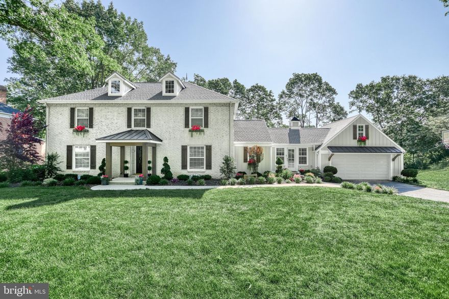 Nestled in the heart of the coveted Point Ridge Farms neighborhood, this extraordinary custom creekside home offers the rare combination of timeless charm and modern luxury. Thoughtfully reimagined through an extensive, multi-year renovation, nearly every inch of this residence has been upgraded while preserving its original character. Boasting 6 bedrooms and 4.5 bathrooms, the home includes both a main-level and an upper-level primary suite, ideal for multigenerational living or flexible lifestyle needs. Timeless curb appeal with a charming covered porch, framed by rich wooden beams, welcomes you through a solid custom front door into a welcoming foyer. The gourmet kitchen is a chef’s dream: heated travertine floors, custom cabinetry with under-cabinet lighting, granite countertops, tile backsplash, 48” gas range with hood, built-in refrigerator and impressive center island. Enjoy panoramic creek views through wall-to-wall windows. Choose to eat in the cozy eat-in kitchen area or in the more formal dining room adorned with wainscoting, crown molding and a ceiling medallion. Family room with wood burning fireplace and decorative mantel. The first-floor primary suite features a spa-like bath with heated ceramic tile floors, a marble-topped double vanity with under-cabinet lighting, walk-in tiled shower with glass doors and bench, and a spacious walk-in closet. Upstairs, a second luxurious suite includes heated ceramic tile floors, quartz counters with under-cabinet lighting, a private water closet, walk-in tiled shower and a large walk-in closet. Three additional upstairs bedrooms and a full hall bath with jetted tub complete with tile surround, heated floors and a double bowl vanity. Cedar closet and pull down attic storage. The finished walkout lower level is a retreat of its own, offering a media area with 120” drop-down screen and projector, exercise space, craft room, additional family room with fireplace, sixth bedroom, full bath, and a wet bar with granite counters, mini fridge, built-in drawer dishwasher and under-cabinet lighting. Step outside to a massive, multi-tiered Trex deck overlooking your newly poured patio with hot tub pad, and lush, level yard with direct access to over 100 feet of Conodoguinet Creek frontage - an entertainer’s paradise and nature lover’s dream. Additional upgrades include: new roof, gutters, fascia, and dormers, whole-house replacement windows, updated HVAC (2 AC units + mini split), new plumbing, electric, and insulation. Finished garage interior, whole-house audio + automatic lighting sensors. Extensive hardscaping, professionally designed landscaping and ambient exterior lighting. New storage shed and rear electric dog fence. New kitchen, wet bar and baths. Main floor laundry, half bath and mudroom off garage. This is a truly one-of-a-kind property offering turnkey luxury, privacy, and rare waterfront living in one of the area’s most sought-after communities. Serviced by Hampden Township and Cumberland Valley Schools. Neighborhood park, sports courts and additional creek access is just down the street. Inquire for the full list of improvements and features or to schedule your own private showing.