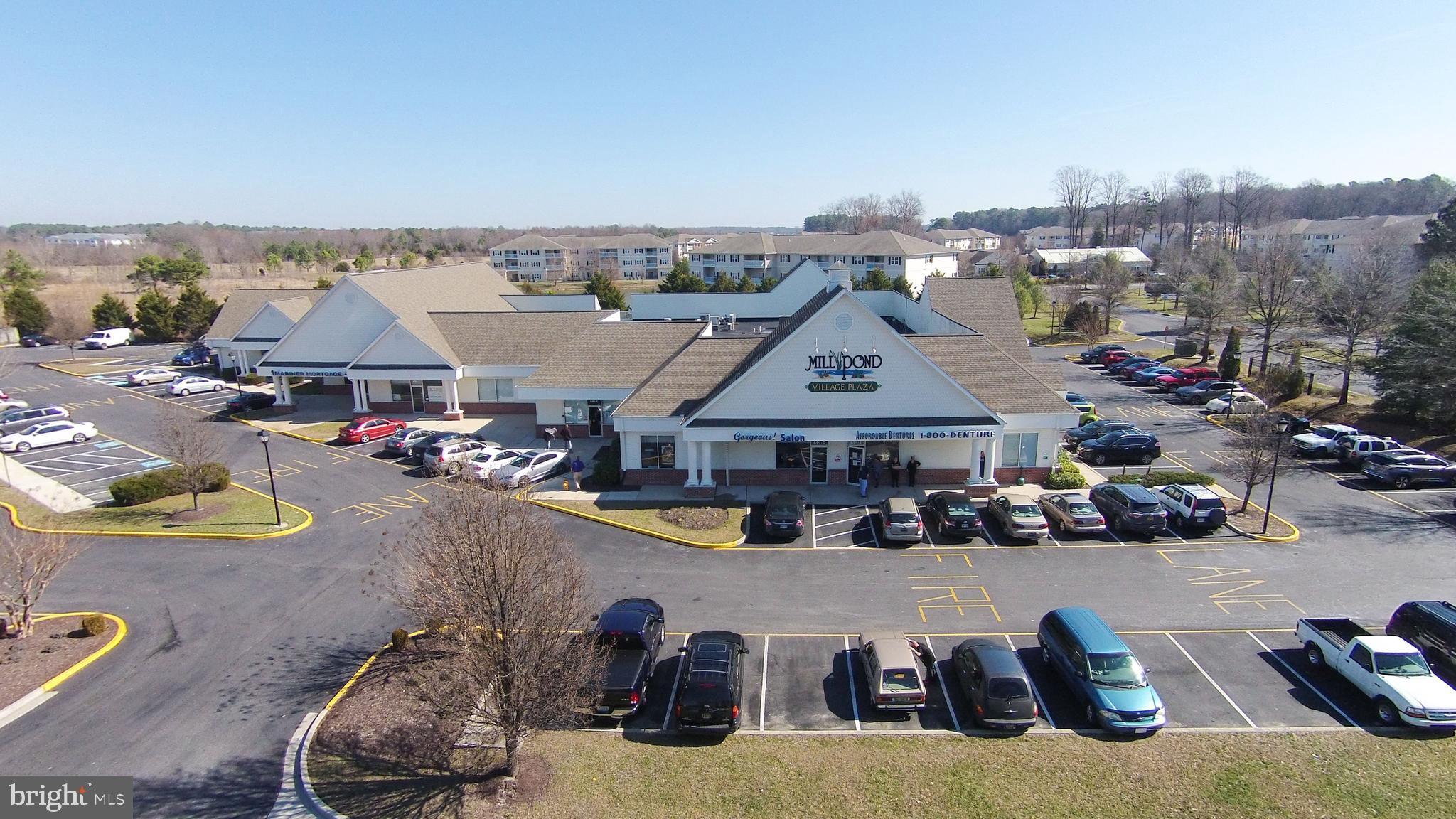 Only vacancy at Mill Pond Village Plaza! This 3,000 SF unit in the 801 building features 3 store front doors with 1,000 SF of finished office space with reception, conference room, office, and break area. The remaining 2,000 SF is an open space with two restrooms and kitchenette area. This space is next to Enhabit Home Health and represents half of the 801 building. The plaza features a well-rounded tenant mix of office, retail, and service providers. The plaza also fronts Mill Pond Apartments which consists of 456 units ranging from 1-3 beds and stays consistently full. All leases are NNN - nets estimate is $4.30 PSF. Space was previously approved for daycare use with up to 2,200 SF of outdoor yard area available.