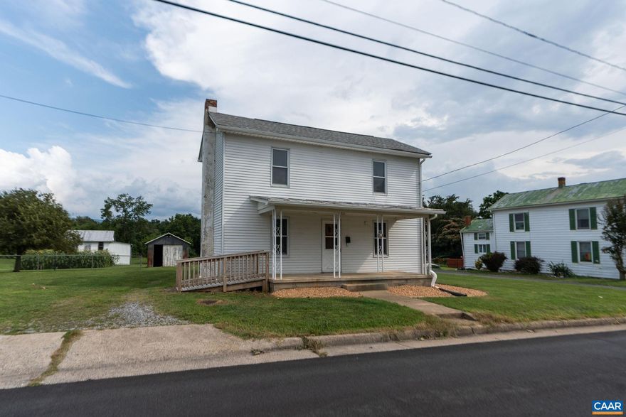 ISO future homeowner ready to quit the commute... We're only 10 minutes from Merck, Coors, and other local employers! And Hello affordable! Plus a Bonu$ = Seller is offering $3,000 toward your closing costs! A great way to keep some extra money in your pocket to use toward additional improvements of your choice after closing! This unassuming yet charming 3 bed, 1.5 bath farmhouse sits on 0.7 acres of scenic rolling grassy land on a quiet, low-traffic street in the Town of Elkton. A handicap ramp from the parking area offers easy access, along with a covered front porch and a side deck for outdoor enjoyment. Inside, you?ll find tasteful updates including an oversized primary bathroom with tons of storage, thoughtfully crafted carpentry including lovely kitchen cabinets. Washer/dryer hookup on the main level adds convenience. Three outbuildings provide great space for storage or hobbies. This home is on public water/septic and located near local retail, employers, The Massanutten Resort, and Shenandoah National Park?ideal as a full-time residence or as a rental for an investor. Come tour this home and see if it is the one! Video tour available!