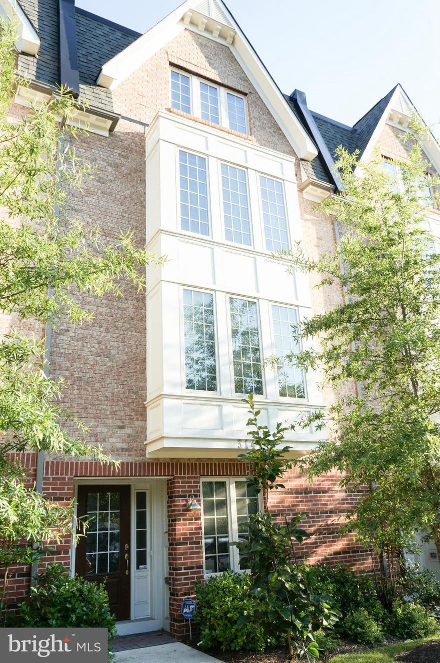 Walking distance to Vienna metro & CUE/Metro bus stop. Five-year-old, modern, light-filled, 4-story townhouse with Master Bedroom on top floor with walkout terrace. Double Vanity.  Open-plan, Gourmet kitchen with Granite Counter tops/Island, stainless-steel appliances (including double-oven) and bar seating. Sunken living room with a Gas fireplace.  2 Garage. Convenient to I-66, Rt 50, Rt 29.