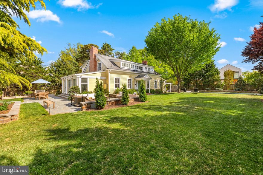 NEIGHBORHOOD TREASURE! Built as a retreat and guest house for the historic 1740 Rosedale estate, the Rosedale Cottage now sits hidden-in-plain-sight adjoining the Rosedale Conservancy with 13,000+SF of exceptionally private and ethereally beautiful level surrounding gardens - all with incredible southern light and striking views of the National Cathedral! The enchanting historic home has undergone significant renovations with great care to preserve its original character and period architectural details, and features nearly 5,000SF of turnkey living space. The home's expansive main level features an elegant foyer, coat closets, and a full bathroom in addition to generously-proportioned, airy public rooms including a large living room with library area, family room with fireplace, elegant dining room, and Poggenpohl kitchen - all with lovely social flow to the incredible grounds and tranquil outdoor entertaining spaces including multiple patio seating areas and heated POOL with adjoining hot tub all surrounded by thoughtful landscaping. Upstairs is a sizable primary suite with fireplace, private porch, en suite bathroom, and dressing room, as well as two additional bedrooms, an additional full bathroom, office area, and laundry. The fully finished lower level features a large family/flex space, bonus room, laundry, full bathroom with steam shower, and ample storage. Property has shared membership of clay tennis court with eight other Rosedale families. DREAM LOCATION - an unrivaled urban oasis just steps from all the amenities of Cleveland Park - multiple schools, countless shops and restaurants, and Metro!