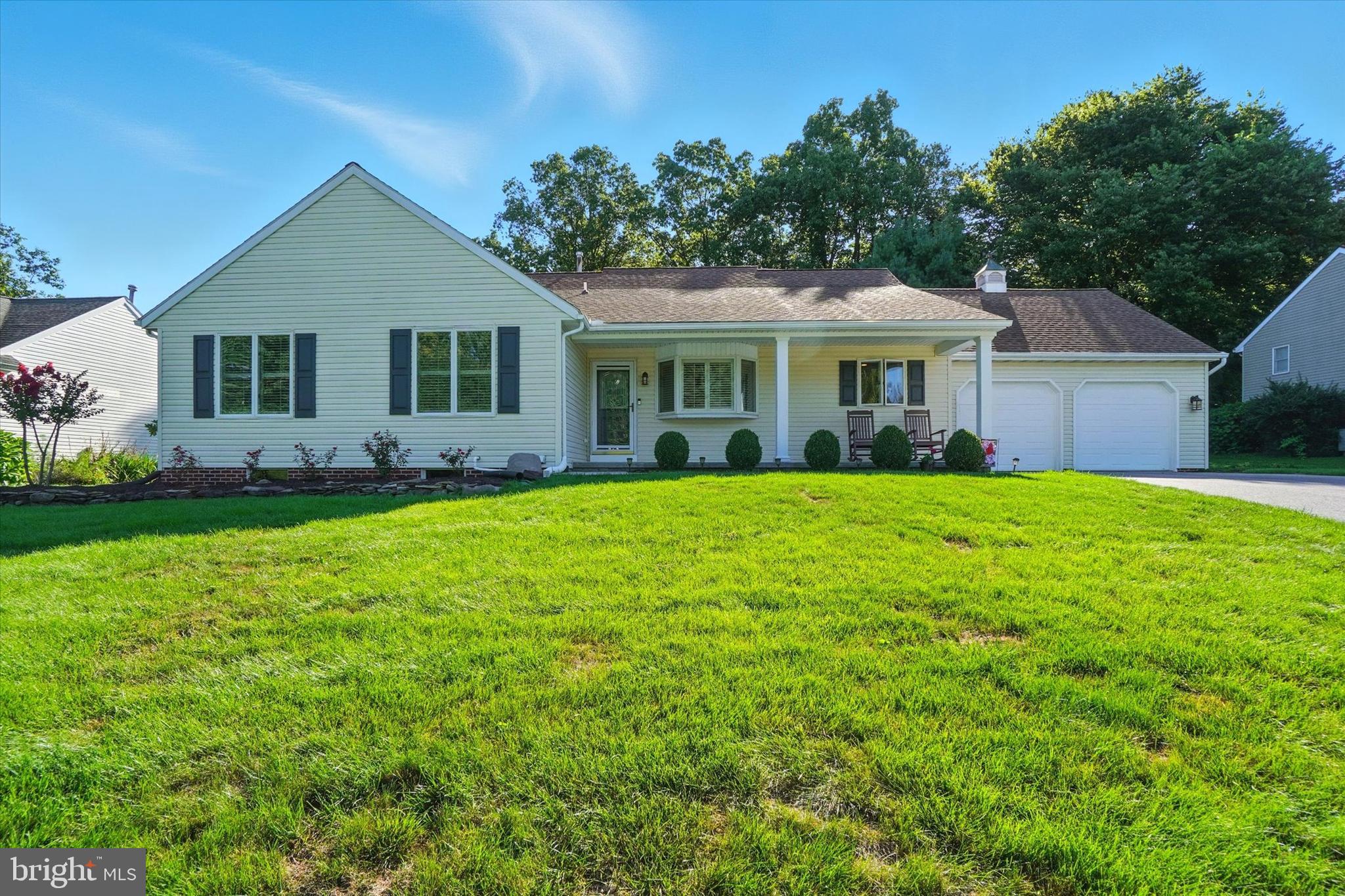 Nestled in the heart of New Freedom Borough, this beautifully maintained ranch-style home offers the perfect balance of comfort, style, and functionality. Spanning 1,880 square feet, the thoughtfully designed layout features three spacious bedrooms and two full bathrooms, ideal for both everyday living and entertaining.
Inside, the warm and inviting living room showcases a stunning stone fireplace, vaulted ceilings, and abundant natural light from skylights, a bay window, and a Palladian window. The upgraded country-style kitchen boasts stainless steel appliances, a pantry, and a comfortable eat-in area, while the dining room provides the perfect setting for family meals and gatherings.
The versatile sunroom, accented with a sliding barn door, offers endless potential as a guest space, home office, or hobby room. The primary suite is a true retreat with a large walk-in closet and a beautifully updated bathroom featuring a tiled walk-in shower. Both bathrooms have been completely renovated with modern finishes. Other highlights include white oak flooring and large open living spaces.
The unfinished basement provides ample storage and potential for future finishing. Outside, the 0.39-acre lot has been professionally landscaped and backs to a preserved land sanctuary, offering privacy and tranquility. Enjoy the peaceful surroundings from the welcoming front porch or rear patio, while the attached two-car garage and extended driveway provide plenty of parking.
Located in a quiet suburban setting, yet just minutes from local amenities and commuter routes, this home is a rare find that blends modern upgrades with timeless appeal.