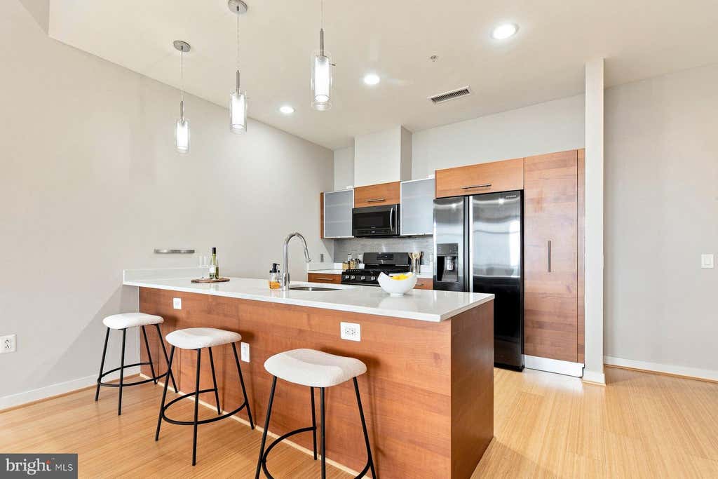 Photo of 12025 New Dominion Parkway #321, RESTON, VA 20190 (MLS # VAFX2337638)