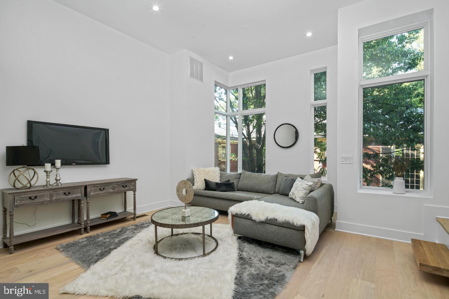 Live in opulence in the fully loaded home at Lippincott Alley. Lippincott is a premier living destination in the heart of Old City. Located next to the historic Arch Street Meeting House, the townhomes at Lippincott provide a sanctuary from the bustling pace of life in the city. Enter your front door from a quiet, brick-paved lane and step into a home that is refreshingly contemporary or enter from your 2-car GARAGE! Enjoy an open concept main level floor plan that is perfect for entertaining. Relax and unwind in the comfort of the living room. This light-filled space highlights the natural beauty of the surrounding landscape. Cooking won't feel like a chore in this gorgeous kitchen equipped with Wolf and Sub-Zero appliances, granite countertops, plenty of cabinets for storage and direct access to your private balcony. The second floor features two large bedrooms with custom walk-in closets. Each bedroom has its own bath - one with a tub/shower combo, the other with a glass-enclosed shower. A bonus feature of the space includes upper-level laundry with Whirlpool front loading washer and dryer. Pamper yourself in the master suite. Enjoy a generous walk-in closet with custom storage system and spa-like master bath featuring a double vanity, free-standing soaking tub, large glass-enclosed shower with multiple shower heads and rain shower plus tons of natural light. A private elevator whisks you up to the roof deck where you can enjoy the view and watch the fireworks at Penn's Landing. The pilot house is equipped with a wet bar, beverage center, open shelving and lounge area - plus a powder bath. Leave the car parked in your private two car garage. Enjoy the ease of being walking distance to the best of Old City - located just minutes from public transit, the city's best restaurants, boutique shops, art galleries and area attractions. Additional features of this 3-4 bedroom, 4 full and 2 powder bath home include include a finished basement, a full bath, flex space for a 4th bedroom and extra storage, gorgeous hardwood floors and tile throughout, high ceilings, and alarm system. Luxury living in one of the most historic locations in the US. What more could you ask for? Schedule a showing today. All square footage numbers are approximate and include above and below grade measurements. Private water $24/month. Tax abatement started in 2019.