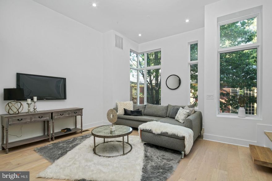 Live in opulence in the fully loaded home at Lippincott Alley. Lippincott is a premier living destination in the heart of Old City. Located next to the historic Arch Street Meeting House, the townhomes at Lippincott provide a sanctuary from the bustling pace of life in the city. Enter your front door from a quiet, brick-paved lane and step into a home that is refreshingly contemporary or enter from your 2-car GARAGE! Enjoy an open concept main level floor plan that is perfect for entertaining. Relax and unwind in the comfort of the living room. This light-filled space highlights the natural beauty of the surrounding landscape. Cooking won't feel like a chore in this gorgeous kitchen equipped with Wolf and Sub-Zero appliances, granite countertops, plenty of cabinets for storage and direct access to your private balcony. The second floor features two large bedrooms with custom walk-in closets. Each bedroom has its own bath - one with a tub/shower combo, the other with a glass-enclosed shower. A bonus feature of the space includes upper-level laundry with Whirlpool front loading washer and dryer. Pamper yourself in the master suite. Enjoy a generous walk-in closet with custom storage system and spa-like master bath featuring a double vanity, free-standing soaking tub, large glass-enclosed shower with multiple shower heads and rain shower plus tons of natural light. A private elevator whisks you up to the roof deck where you can enjoy the view and watch the fireworks at Penn's Landing. The pilot house is equipped with a wet bar, beverage center, open shelving and lounge area - plus a powder bath. Leave the car parked in your private two car garage. Enjoy the ease of being walking distance to the best of Old City - located just minutes from public transit, the city's best restaurants, boutique shops, art galleries and area attractions. Additional features of this 3-4 bedroom, 4 full and 2 powder bath home include include a finished basement, a full bath, flex space for a 4th bedroom and extra storage, gorgeous hardwood floors and tile throughout, high ceilings, and alarm system. Luxury living in one of the most historic locations in the US. What more could you ask for? Schedule a showing today. All square footage numbers are approximate and include above and below grade measurements. Private water $24/month. Tax abatement started in  2019.