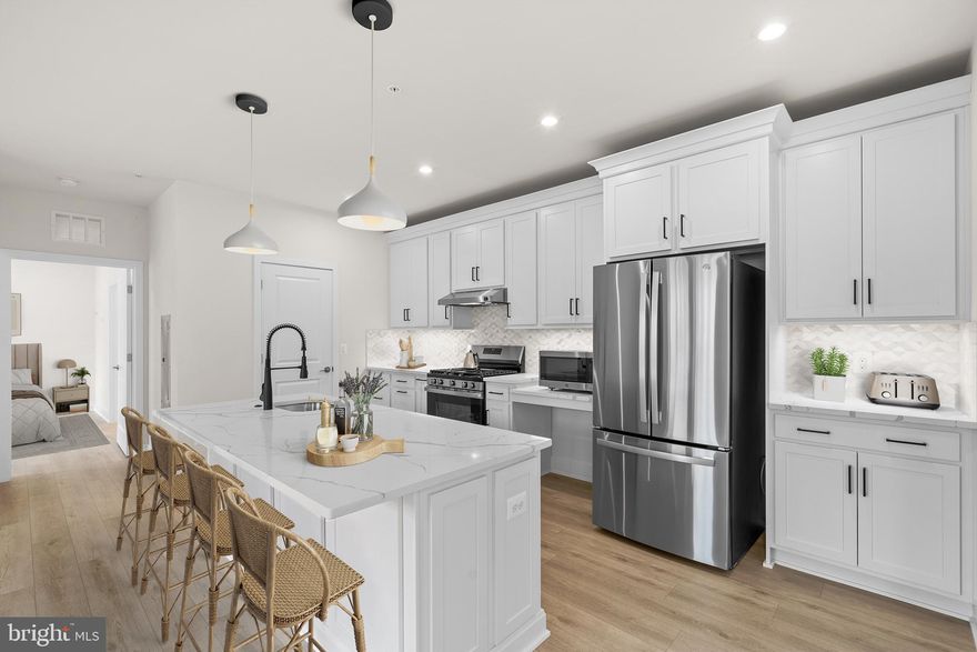 Step into luxury and accessibility with the YORK (ANSI) floorplan. This brand-new ACCESSIBLE ACTIVE ADULT (55+) CONDOMINIUM is ready to move in. This unit by Van Metre Homes at BIRCHWOOD provides luxury living at its finest! This stunning condominium boasts 1,431 finished square feet of masterfully crafted space with 2 bedrooms and 2 full bathrooms all on one level with lofty 9-foot ceilings. As you enter, be greeted by the warmth of natural light and sparkle from luxury vinyl plank flooring, connecting and highlighting the stylish open floor plan of this spacious abode. Relish in the home’s large living room, comfortable dining room, and a showpiece premier kitchen, where upgraded cabinets, quartz countertops, tile backsplash, and stainless-steel appliances elevate the culinary experience. Need some fresh air? Step onto your personal balcony to prepare for the day ahead or unwind from its adventures. Your private oasis awaits in the impressive primary suite, complete with a generous walk-in closet and a luxurious 4-piece bathroom featuring double sinks and a large frameless shower enclosure with a built-in seat – the epitome of relaxation and comfort. This impeccable condo offers an additional bedroom and full bathroom to accommodate your needs and lifestyle. Accessibility is paramount, with a roll-in shower and grab bars conveniently located in the unit's hall bath, meeting ANSI accessibility standards for enhanced comfort and independence. Washer and dyer included! Additionally, this residence includes a 1-car garage with electric car charging capabilities, providing both security and convenience for your vehicle. Being a new build, your home is constructed to the highest energy efficiency standards, comes with a post-settlement warranty, and has never been lived in before! Elevate your living experience with the YORK  (ANSI) floorplan with unparalleled elegance and accessibility. Schedule your appointment today! ----- Located in Northern Virginia, Birchwood at Brambleton is an Active Adult (55+) community that offers one-level condominiums and spacious single-family homes. Residents benefit from its close proximity to Brambleton’s restaurants, shopping, movies, and community events. The community boasts top-notch award-winning amenities like indoor and outdoor pools, bocce and pickleball courts, a fishing pond, and a golf simulator. Additionally, Birchwood at Brambleton’s convenient location places it just minutes away from Metro’s Silver Line, Dulles International Airport, commuter routes, and health centers, making it a prime destination for those seeking a well-connected and vibrant lifestyle.
 ----- Take advantage of closing cost assistance by choosing Intercoastal Mortgage and Walker Title.  Pricing, incentives, and homesite availability are subject to change. Photos are used for illustrative purposes only. The community lies within the Airport Impact Overlay District (within the 1 Mile Buffer). Due to its proximity to Dulles International Airport, this site is subject to aircraft overflights and aircraft noise. For details, please consult the  Community Experience Team.