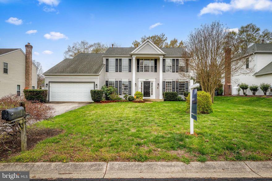 4 bed 2.5 Colonial in sought after Meadowland. Beautiful flooring througout! The 2 story foyer welcomes you in and the flowing floor plan leads you from the the living room with french doors that could easily double as an office, formal dining room, kitchen including eat in space and family room with cozy fireplace and walkout to deck and fenced in the back yard. Generously sized rooms upstairs including primary suite with walk in closet. Unfinished basement with endless possibilities including more finished living space or tons of storage. 2 car attached garage. Welcome Home!