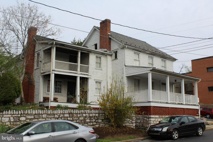 The Arbutis House--Located on one of the first residential streets in Martinsburg.  It was bought in 1854 for $210 and held in the Arbitus family until 1935 and has all the interesting details of that period but it does need complete rehab. A few homes neighboring  this home have been beautifully rehabbed. House is being sold as is.   Has been used as a 3 apartment building in the past.