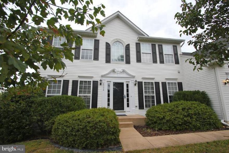 Beautiful and ready to move in, with over 4,000 finished sq feet! Vaulted ceilings in family room with cozy fireplace. Two story foyer and gleaming hardwood floors. Spacious kitchen opening to huge  family room great for entertaining. Formal dining room & living room with bay window. Finished basement with full bath .Ready Sept 1