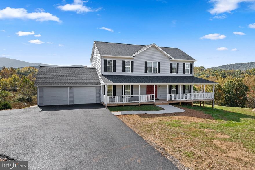 Large and open home with spectacular views of the Shenandoah mountains.  Situated on 10 acres, this 4-bedroom home was built in 2022 and has ample sunlight, spacious living, and a grand 3-sided wrap-around porch.  Enjoy your morning coffee and watch the sunrise over Skyline Drive from the front porch, and end the day watching the sunset over the mountains on the rear deck.  The main level includes a primary bedroom suite with access to the side porch, a large living room, and a huge kitchen/dining room combination with Stainless Steel appliances and granite counters.  Off of the two-car garage is the laundry room and a half-bath.  The upper level includes the remaining three bedrooms and two bathrooms, plus there are two large open area sitting rooms that can be used as a family room, den, craft room, sewing room, game room, etc. The options are unlimited.  The unfinished basement is great for storage and exercise equipment and has walkout access to the rear yard.  The lawn cutting around the home is the tenant responsibility, but the remainder of the 10 acres will be bush-hogged 1-2 times per year at the landlord expense.  This is an A+ property.