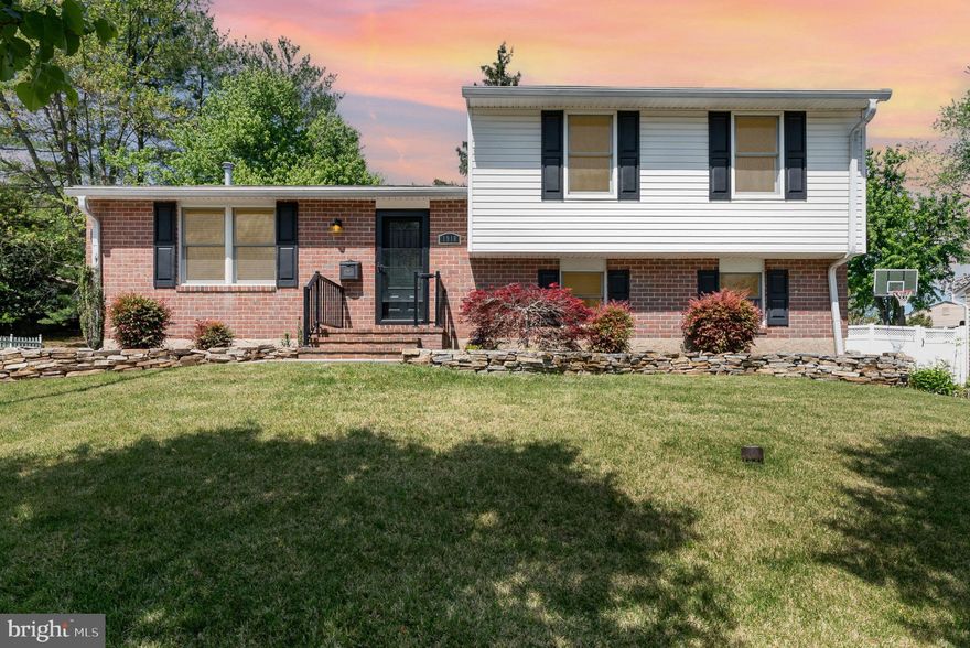 Expected on market date 5/2/25. Welcome to 1918 Westchester Avenue, a rare split level with three levels of finished living space and an unfinished basement with ample storage.  The main floor includes the living room and an open dining room/kitchen combination, all with hardwood floors. The kitchen has been updated with white cabinetry, granite countertops, stainless steel appliances and custom fittings to maximize storage.  On the top floor is the primary bedroom with ensuite bath, two generous additional bedrooms and an updated hall bath. On the floor below the kitchen is a family room with a walk out to the fenced back yard, a powder room and another bedroom with its own accessible ensuite bath. The lowest level is ready for all your storage needs.  Furnace and A/C were replaced in 2021 and a new water heater is being installed.  The larger of the two outdoor sheds has electricity. There is also a spacious deck off the main level for seasonal enjoyment.  Summer is great in 21228! Hurry to see this one before it's gone.