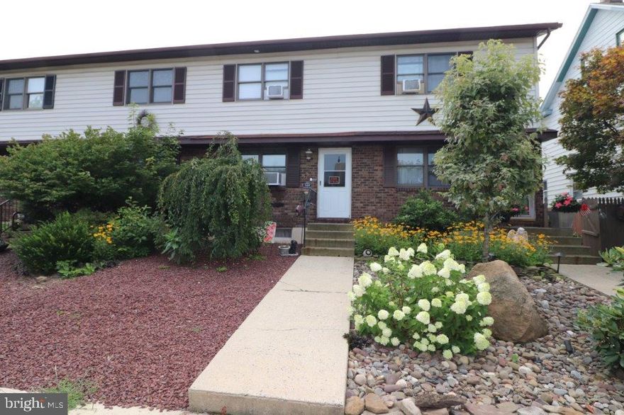 GREAT HOME! GREAT LOCATION! Well maintained and SPACIOUS . . . 3-BR, 1-BA townhome nestled in the borough of Palmerton is a MUST SEE! The open/combo living room greets you the moment you enter that can be transformed into a dining room for your formal family and holiday needs. The modern Eat-In-kitchen, remodeled in 2021, features wood cabinets, granite countertops, tile backsplash, LTV floors and stainless appliances! The bathroom, also remodeled in 2021, with a newer vanity, lighting, bathtub and wood LTV floors! Freshly painted bedrooms (2025), with the middle bedroom includes a skylight! Partially finished basement includes laundry area, and a family or entertainment room. There's also a crawl space, perfect for your storage needs. Nicely landscaped gardens, rear patio, fenced in yard and off street parking for 2 vehicles! Conveniently located, minutes to parks, churches, schools and downtown shopping! Call TODAY! While the home is located in a flood zone, the seller does is not required to carry flood insurance with her mortgage, please reach out to your lender for insurance coverage requirements.