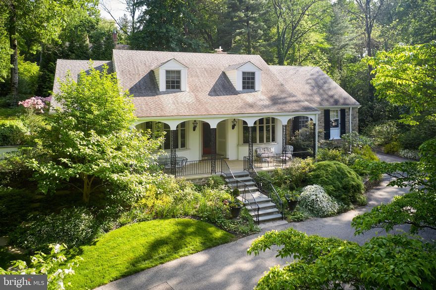 Welcome to this beautiful, secluded property in north-side Haverford, with approximately one acre of manicured grounds set back off the main road, through a winding, picturesque, private driveway surrounded by specimen plantings and gardens.  A custom-built home by Pasquale Beccia in 1950, plus many updates by the current owners inside and out, provides for all the conveniences of new construction (see attached Key Improvements for upgrades and additions) while keeping the ultimate graciousness and integrity of the original home and property.  This home has 4 bedrooms, 4 full baths, and 2 half baths, divided into two ensuites on the first floor and two ensuites on the second floor.  Lovely, generously proportioned rooms throughout, high ceilings, large windows with amazing views, random width and length pegged wood floors, and an expansive covered front porch make this home gracious and warm.
Enter through the front door to the wide center hall, pass the powder room and up a few steps through the foyer.  You will immediately be drawn straight ahead to the expansive formal living room with French Doors to terrace, gas fireplace, built-in shell cabinetry, and stunning views of gardens and grounds that are also enjoyed from the gracious formal dining room.  A Chefs gourmet kitchen with high end appliances and breakfast room, mud room with access to private, walled terrace and garden, cozy family room with built-ins and wet bar and the first-floor home office (or bedroom), full bath with laundry and primary bedroom suite with walk-in closets and radiant heat bathroom floors complete the first floor.  Enjoy the customized, zoned, Sonos sound system for individualized listening pleasure in any space of the entire first floor.
Stairs lead you to the second floor landing and 2 additional, large, ensuite bedrooms with bath/shower combos and plenty of closets.  Additional attic space can be finished or used for extra storage.
The basement holds the home gym, a custom-built wine cellar that can store approximately 1,500 bottles, plenty of storage, open closets, half bath, and access to oversized 2 car garage with an elevator shaft that accesses the main floor.   
Convenient to SEPTA (R5), Bryn Mawr, Haverford, Gladwyne and Ardmore’s many boutique shops and delicious restaurants, and in close proximity to Pennsylvania's best public and private schools.  This home is special in every way and a must-see!