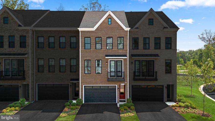 Discover a brand new TOWNHOME by Van Metre Homes at WEST PARK, ready for move-in NOVEMBER 2025. Built as the designer model, this home offers a blend of designer finishes, upgraded features, and structural enhancements. Step into the Tanner 22-F2 – Homesite 4581 at West Park III—a two-car, front-load garage townhome with four bedrooms, four full bathrooms, and one half bathrooms. Designed for seamless living, this floorplan maximizes every square foot with a café space perfect for morning coffee, gourmet kitchen and spacious great room for hosting, and standout primary suite with a walk-in closet to elevate your living experience. Offering an impressive 2,882 square feet spread across four levels!  As you enter, the main level welcomes you with an inviting open floor plan highlighted by 9 ft. ceilings and luxury vinyl plank throughout the entire home.  At the heart of the home separating the dining room and great room, the spacious central kitchen awaits, a culinary haven, complete with an kitchen island, soft-close cabinets, quartz countertops, and stainless-steel appliances. Venture to the upper level and discover an indulgent primary suite boasting a generous walk-in closet and a spa-like 4-piece luxury bathroom. Pamper yourself in the oversized shower with a built-in seat and enjoy the convenience of double sinks. This level also hosts 2 additional bedrooms, 1 full bath, and a well-placed laundry room. But the luxury doesn't end there. Enjoy seamless indoor-outdoor living with a deck extending from the great room, a private patio for casual gatherings, and a rooftop terrace offering panoramic views and open-air lounging. On the ground level, discover a welcoming foyer with additional bedroom and full bathroom and easy internal access to the large garage. Being a new build, your home is constructed to the highest energy efficiency standards, comes with a post-settlement warranty, and has never been lived in before! This residence is not just a house; it's an experience, a harmonious blend of thoughtful design and contemporary luxury. Make your move now. Schedule an appointment today! ----- Welcome to West Park III, a vibrant neighborhood of dreamy townhomes with rooftop terrace options in the award-winning community of Brambleton, VA. Experience an exceptional living experience in Brambleton, a flourishing community where modern living meets suburban charm. This family-friendly community offers miles of trails, tot lots, parks, pools, highly sought-after schools within walking distance, and so much more at your fingertips. With the bustling Brambleton Town Center just down the street, you can enjoy endless shopping, dining, and entertainment options. Rise to new heights at West Park III and experience the perfect blend of comfort, convenience, and connectivity—a place where cloud nine is just the beginning. ----- Take advantage of closing cost assistance by choosing Intercoastal Mortgage and Walker Title. ----- Other homes sites and delivery dates may be available. ----- Pricing, incentives, and homesite availability are subject to change. Photos are used for illustrative purposes only. For details, please consult the Sales team.