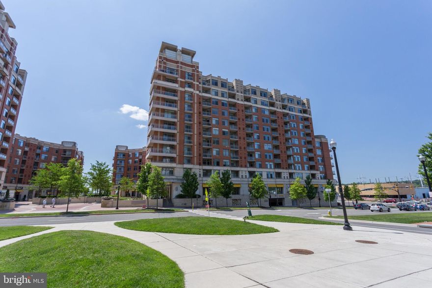 Fully Furnished two bedroom Condo close to Reagan {National Airport} 7 minutes to Wash.DC,2 blocks from Potomac yard shopping center,Harris Teeter  in the bldg.this unit with L shape balcony provides nice view of the area.Each bed room has its balcony,Hardwood on the main floor and carpet in bedrooms,granite counter tops with stainless steel appliances,50"TV.2 garage parking.Come and see Yourself;
