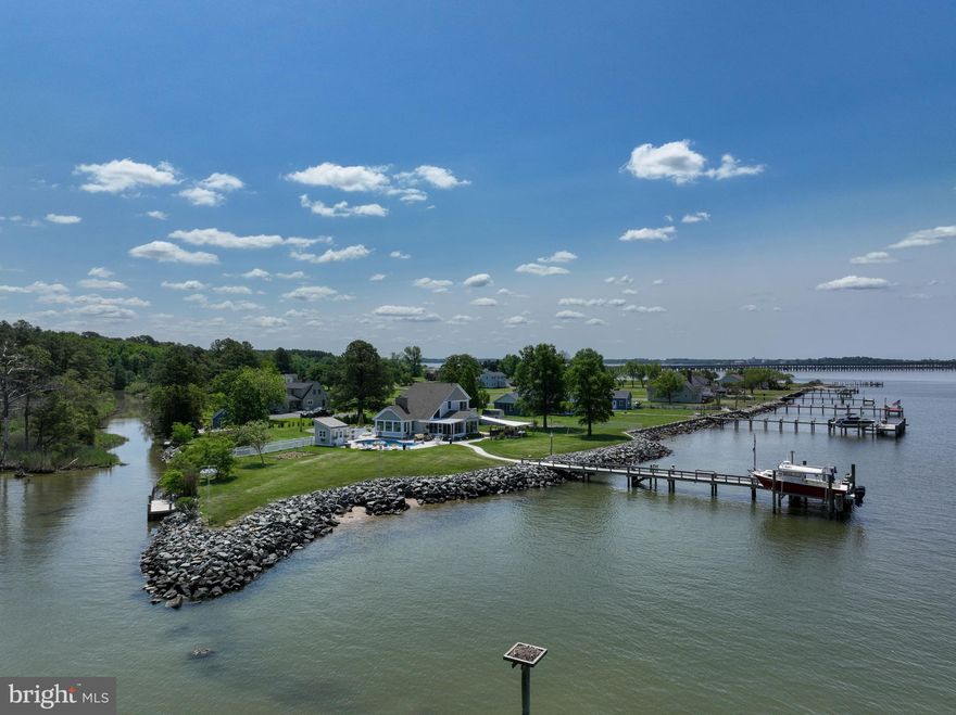 Water, water everywhere!    If you love sunsets,  breathtaking waterviews of the River and awesome sunsets, then this is the home for you.  Entertain in the outdoor kitchen, solar heated salt water pool or just relax on the patio.  2 car garage with attic storage, bright sunny kitchen and breakfast room, screened porch, large fenced yard, garden area and 2 separate docks. Fish/crab off the pier or canoe/kayak up the canal and river. Exterior n interior Security cameras are active 
Easy access to Route 50...one hour to MD/DE beaches...45 mins to Annapolis.  This is a one of a kind property!  You must see for yourself...Schedule a private showing, won't last long!!!