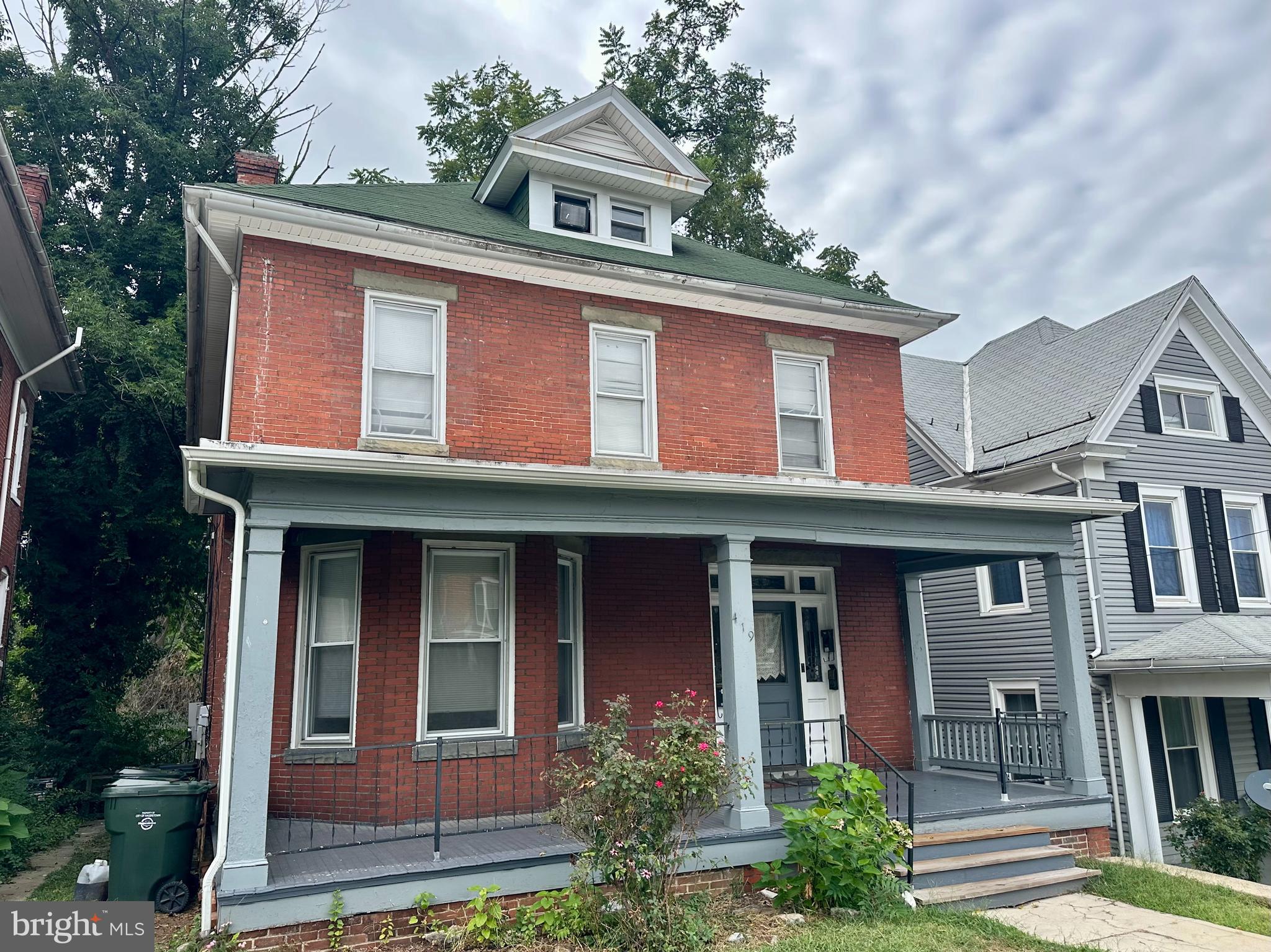 Great positive cashflow investment opportunity! Well maintained 5 unit apartment building not far from beautiful City Park, Meritus Park, University of Maryland Hagerstown Campus, Barbara Ingram School of the Arts, Maryland Theatre, restaurants and more! This building is fully occupied and produces approximately $4,700 a month in income! Natural gas forced air heat! This property includes 2 buildings: front building has 3 units and the rear building has 2 units. Large backyard,. The owner will consider holding owner financing. Owner is also selling 311 Summit Ave with 6 units.