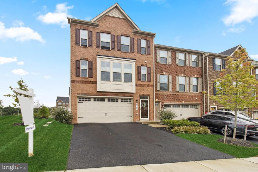 This extra-large, end-unit luxury townhome is located in the highly sought-after neighborhood of Norborne Park. Constructed in 2019 by Ryan Homes, this "McPherson" has all the bells and whistles, include the 4th-floor addition with and loft, bedroom, full bath, and outdoor space. The owners have meticulously cared for this property, with tasteful design choices and feature walls, giving it a model home feel. The main level has an open living room with huge windows and a bump-out extended dining area, perfect for fine dining and entertainment. The gourmet kitchen includes stainless steel appliances, granite countertops with a huge center island, a beautiful tile backsplash, a double wall oven, plenty of cabinet space, plus a double door food pantry, and a bonus butler's pantry with custom shelves. The deck leading from the dining area has plenty of space for entertaining. The first upper level boasts 3 spacious bedrooms & 2 full baths. The owner's suite has a large walk-in closet and a luxurious en suite boasting a soaking tub and large glass-paned shower along with a double sink vanity. The lower level is fully finished and entirely above ground, which includes a walk-out in the rear to a fenced-in yard, access to a 2 car front load garage & mudroom entry, and a bonus room currently used as an office. Many environmentally friendly features include a tankless water heater, double pane windows, a smart thermostat, and sustainable flow toilets.  Easy commute to DC, Westphalia Recreation Center, Andrews AFB, shopping, and more! Don't miss out on this fantastic opportunity!