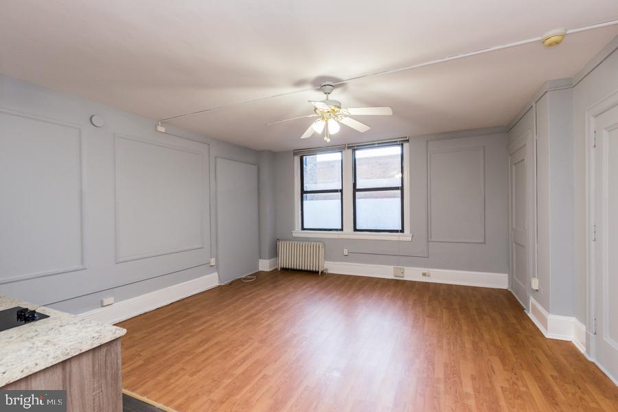 We are scheduling both in-person and virtual tours for this listing. Available Now | Owner will cover the $250 move-in fee & only first-month rent & security deposit due upfront This lovely studio is available now for rent, in the heart of center city, with all utilities included in rent! Clean, modern finishes like hardwood floors, and a long list of building amenities are sure to catch your attention. The unit comes with a microwave, stove top and mini fridge. The Arts Condominium offers a 24-hour front desk concierge, elevators, fitness center, laundry facilities, bike storage, and the only additional cost is in-unit internet, but you can always use the free wi-fi in the lobby. There's also a barber shop, secure package pickup, and a resident lounge in this truly convenient building. About The Neighborhood: Centrally located just off Broad Street, and walkable to a long list of convenient and fun neighborhood favorites. The iconic Avenue of the Arts is home to big names like the Kimmel Center, Academy of Music, Wilma Theater, University of the Arts, Suzanne Roberts Theatre, amazing eateries like City Diner, Sumo Sushi, Big Gay Ice Cream, Giorgio on Pine, Volvér, and hotspots such as Woody’s, Fox & Hound, Howl at the Moon, and MUCH more! Walkable to City Hall, Washington Square West, Midtown and Rittenhouse Square areas. SEPTA’s Broad Street subway line at Broad/Walnut is at the end of the block; PATCO station is right across the street from the building. Lease Terms: Owner will cover the $250 move-in fee & only first-month rent & security deposit due upfront. Other terms may be required by Landlord. $45 application fee per applicant. Pets are conditional on owner’s approval and may require an additional fee, if accepted. (Generally $500/dog and $250/cat). 1 pet maximum per unit. Building pet registration and policy: $120 nonrefundable pet registration fee, and $10 freight elevator fee, which must be used for pet transportation. 40lb weight limit for pets. Breed restrictions– please speak to a listing agent to discuss pet policy details. All utilities are included in rent, tenants responsible for in-unit internet. The fee to use the Bike Storage Room is $50.00 and tenants are provided with a key to the room. There are bike racks in the room and it is totally up to the tenant whether they wish to secure their bike with a lock. The room, itself, is locked and only available to other residents with keys to the room. Residents using the Bike Room need to know that bikes can only be transported through our side entrance and then their bike must be carried through the lobby, down the steps and into the Bike Room. It is permissible to keep your bike in your condominium, as an alternative, in which case the resident will purchase a key to the freight elevator for $10.00.