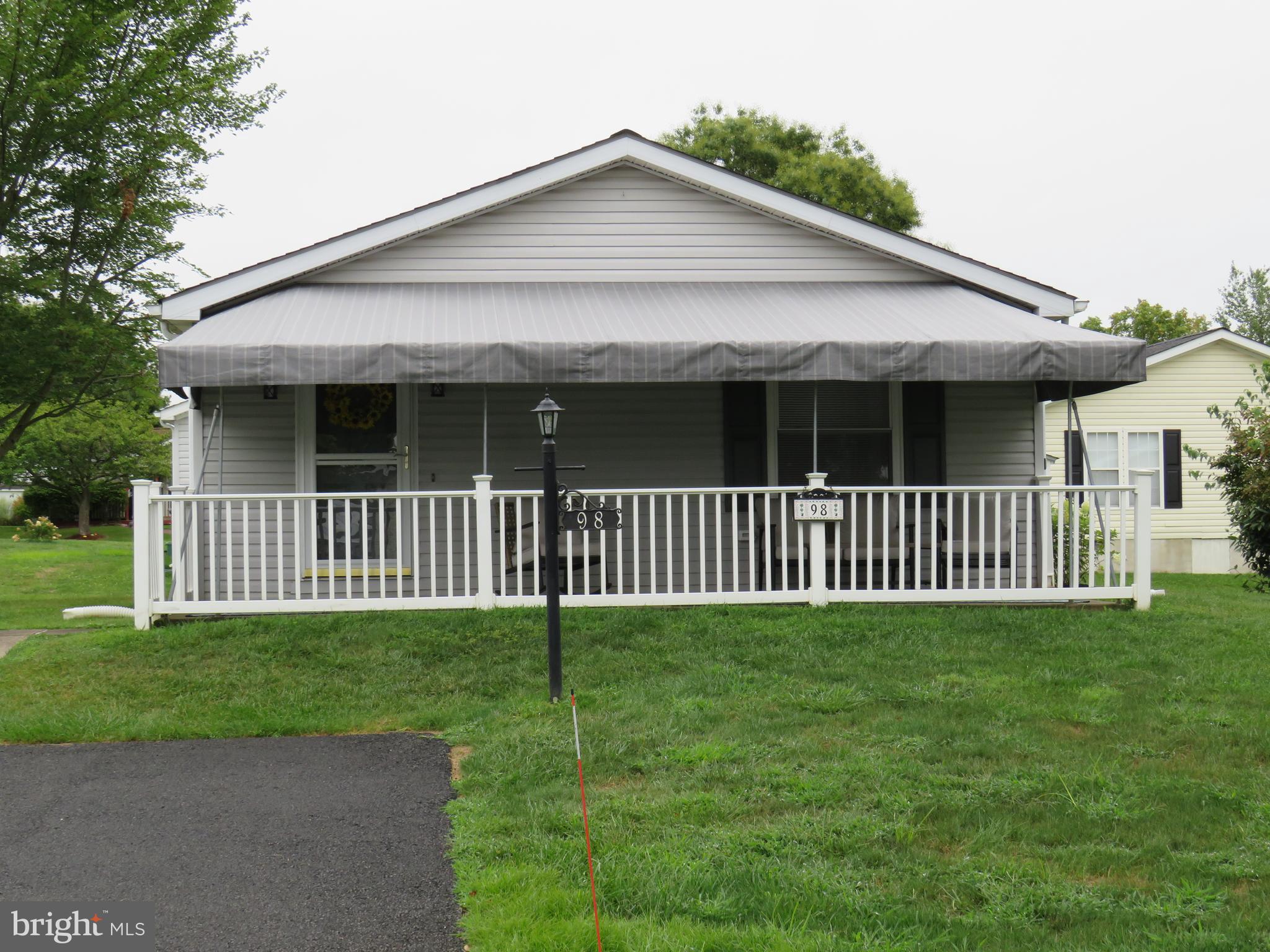 This home is completely renovated top to bottom and ready for you to move right in!!! Large front covered porch, new kitchen with back splash, Granite counters and all new appliances. New ceilings throughout with recessed lighting and new light fixtures. New over under washer and dryer, all new flooring throughout the house. Both bathrooms have been renovated. Outside 220 outlets on both sides of the house. Three bedroom windows replaced.. Shed rebuilt and owners did home inspection and repaired everything that was found. Quick settlement available, Lot is larger, and you may be able to add a sunroom (with community and township approval). Walkable to mailbox, clubhouse and pool. This community has a lot of activities for you to enjoy. Come take a look and be ready to make this your new home!!!!