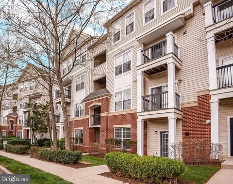 Photo of 11321 Aristotle Drive #3-303, FAIRFAX, VA 22030 (MLS # VAFX2314210)