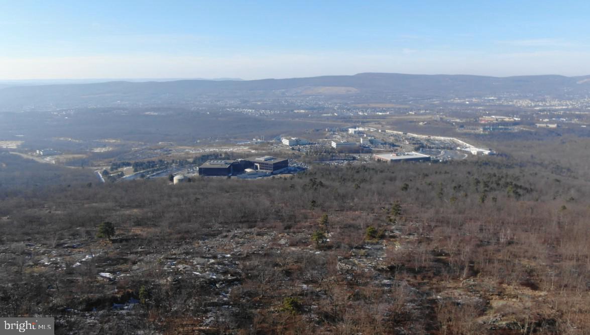 Located at the top of the mountain near the ski slopes, featuring spectacular views, this unique parcel offers so many possibilities. Zoned R1-C / Conservation and Planned Recreational.