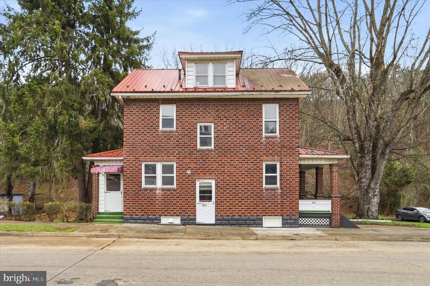 Welcome to 465 Warren St in Cumberland, MD!  A recently remodeled four bedroom, two bath brick home that is truly move-in ready. This inviting property blends classic character with updated finishes, featuring spacious living areas, attractive flooring, and a bright, updated kitchen with white cabinetry, modern countertops, and stainless steel appliances. Enjoy the charm of the covered porch and the comfort of a home that has already had the work done for you. A great opportunity for a buyer looking for space, style, and value in one package.