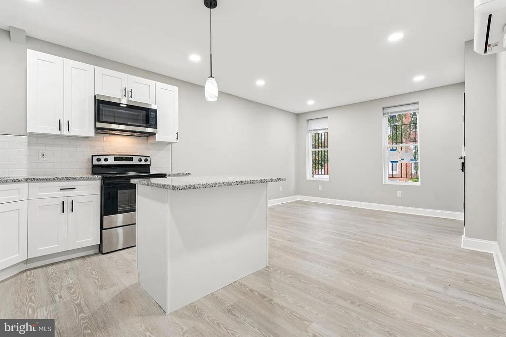 Photo of 916 N Arlington Ave #1, BALTIMORE, MD 21217 (MLS # MDBA2186738)